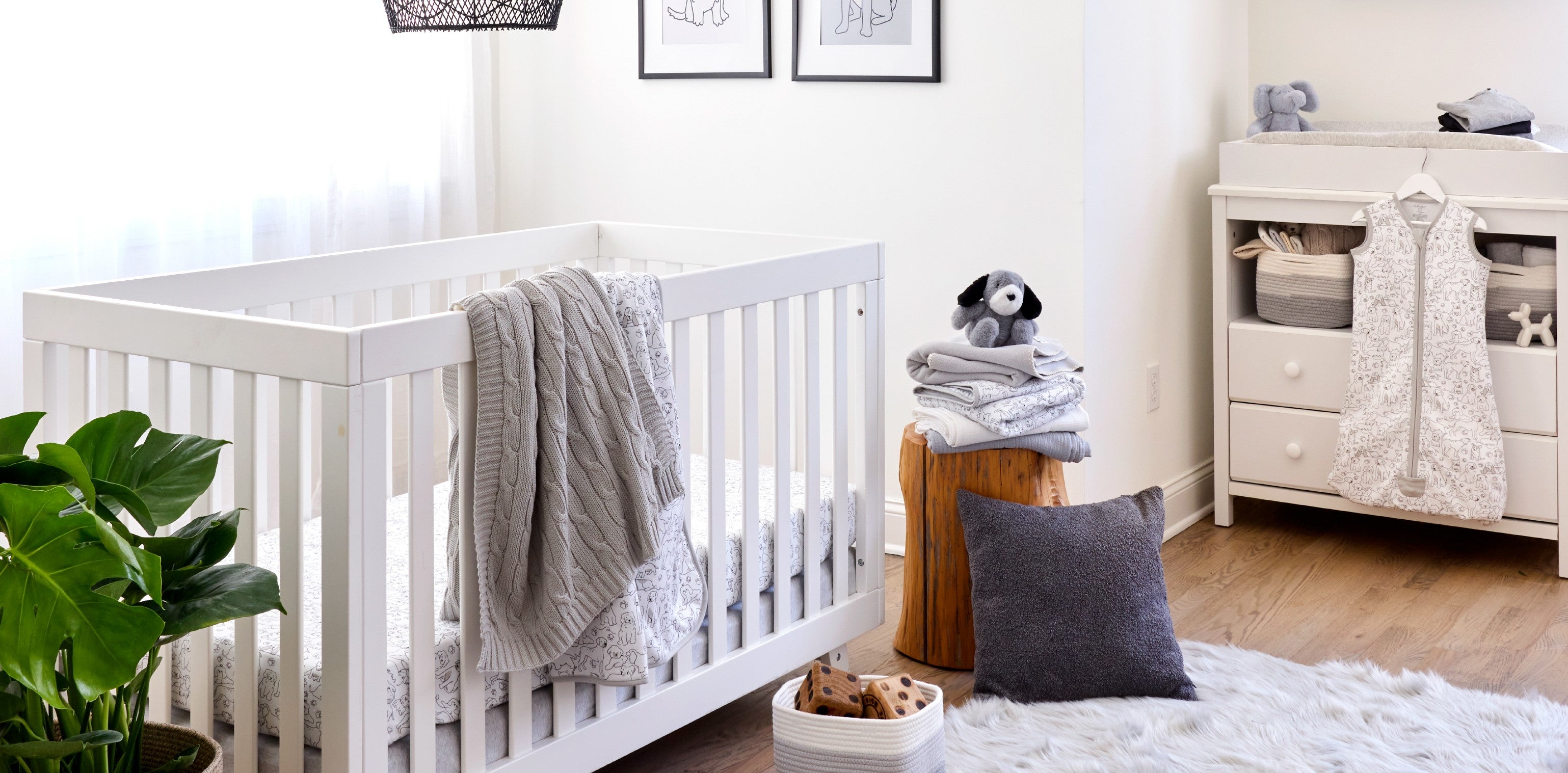 Puppy Party nursery collection — organic baby bedding, swaddles, and decor with playful puppy print from Butterblu