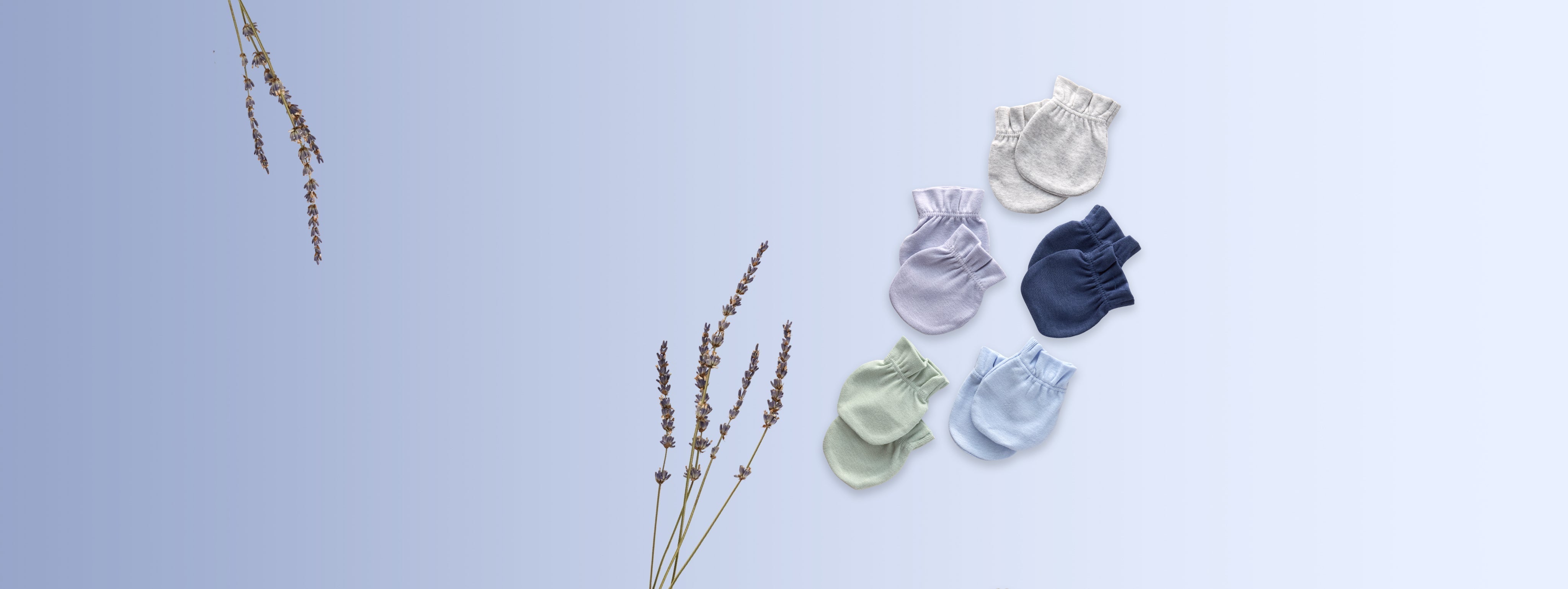 Butterblu stuffed animals and rattles for baby girls and boys — GOTS-certified organic cotton lovey toys, plush snuggle buddies, and rattles