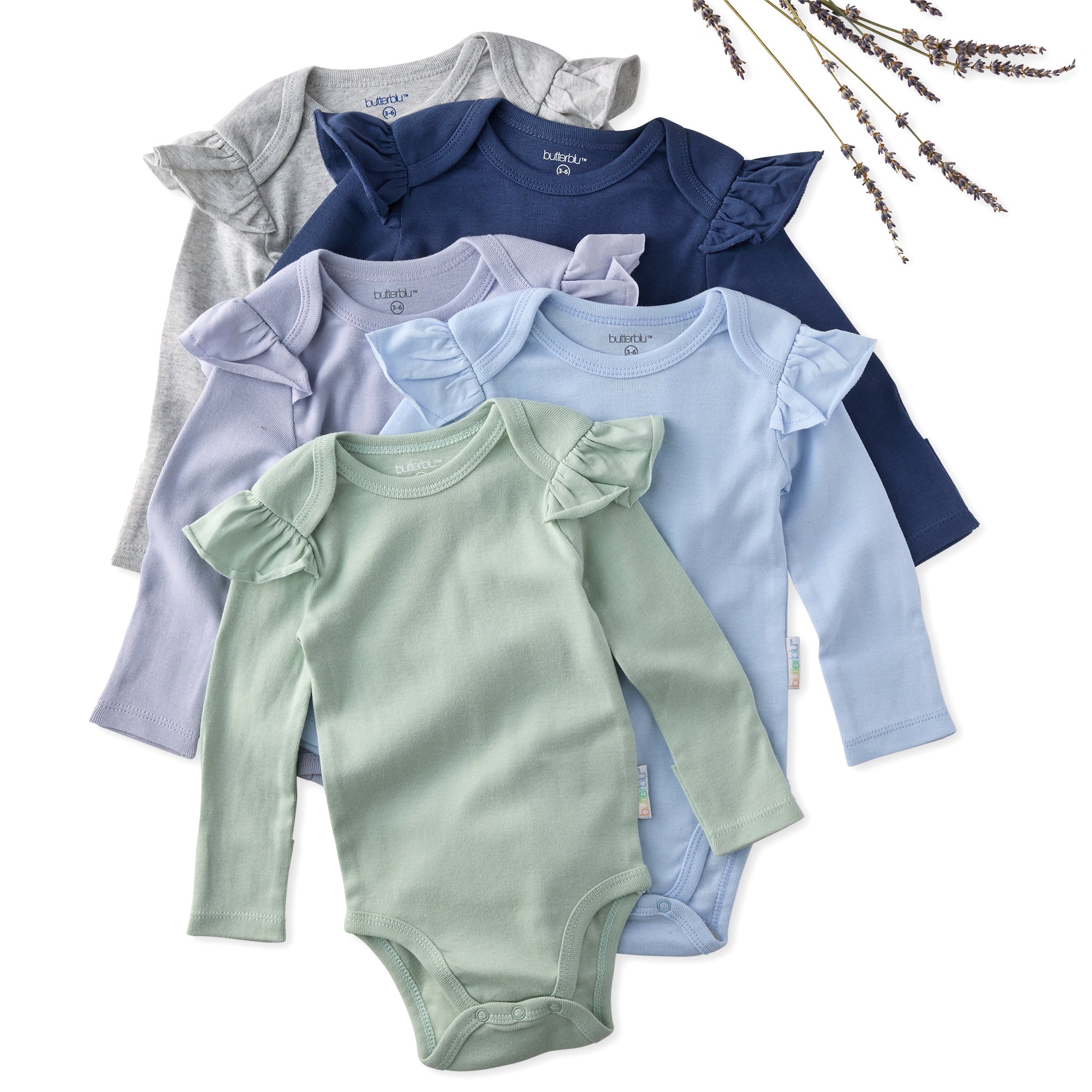 Set of baby bodysuits in various colors on a white background