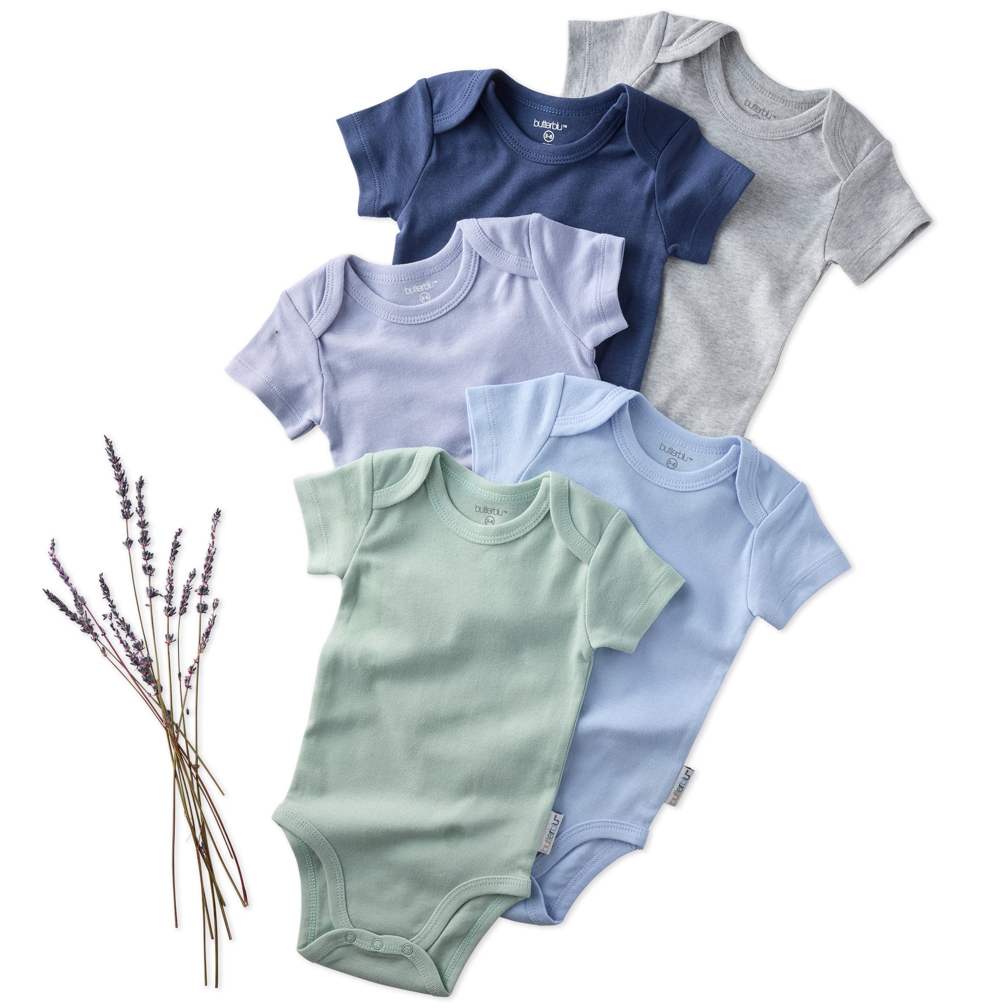 Five baby bodysuits in blue, gray, green, and light blue on a white background with lavender.
