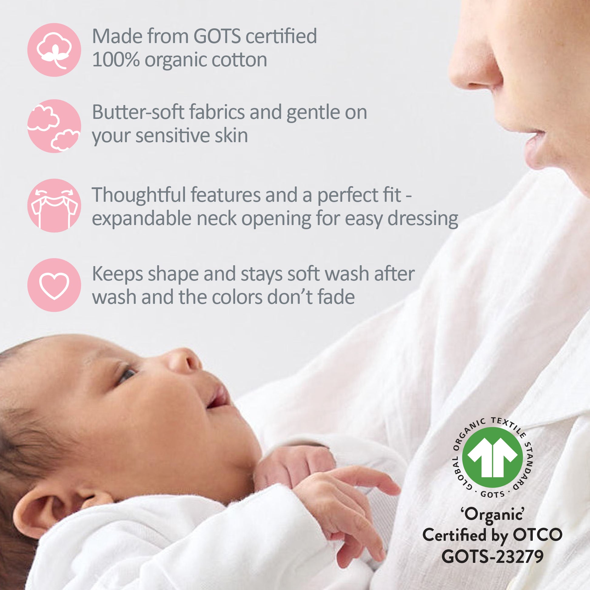Baby wrapped in organic cotton fabric with a woman, featuring GOTS certification details.