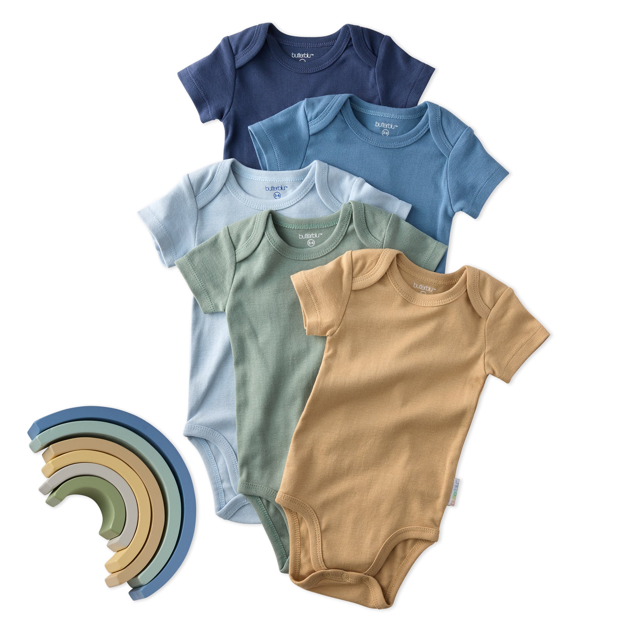 Set of baby bodysuits in various colors with a rainbow toy on a white background