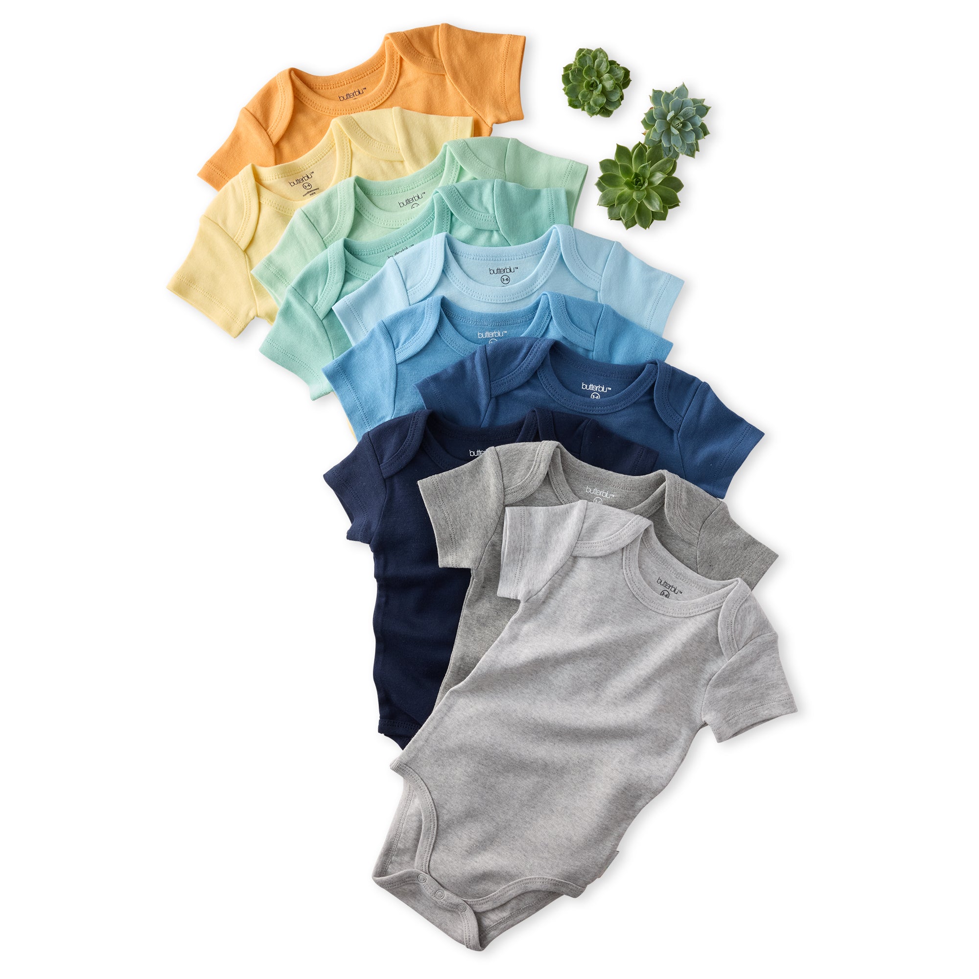 Set of colorful baby bodysuits arranged in a row on a white background.