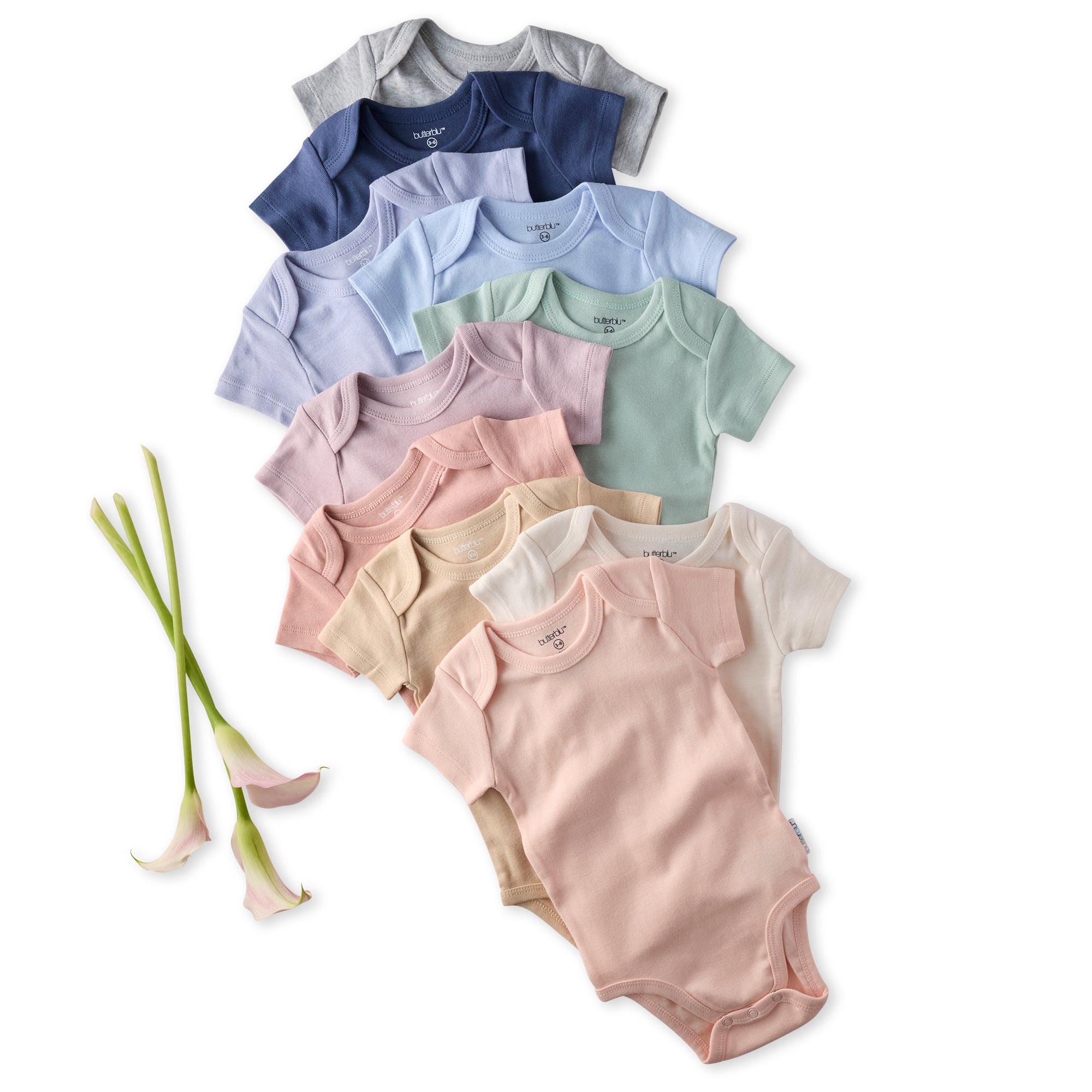 Set of colorful baby bodysuits with a white background