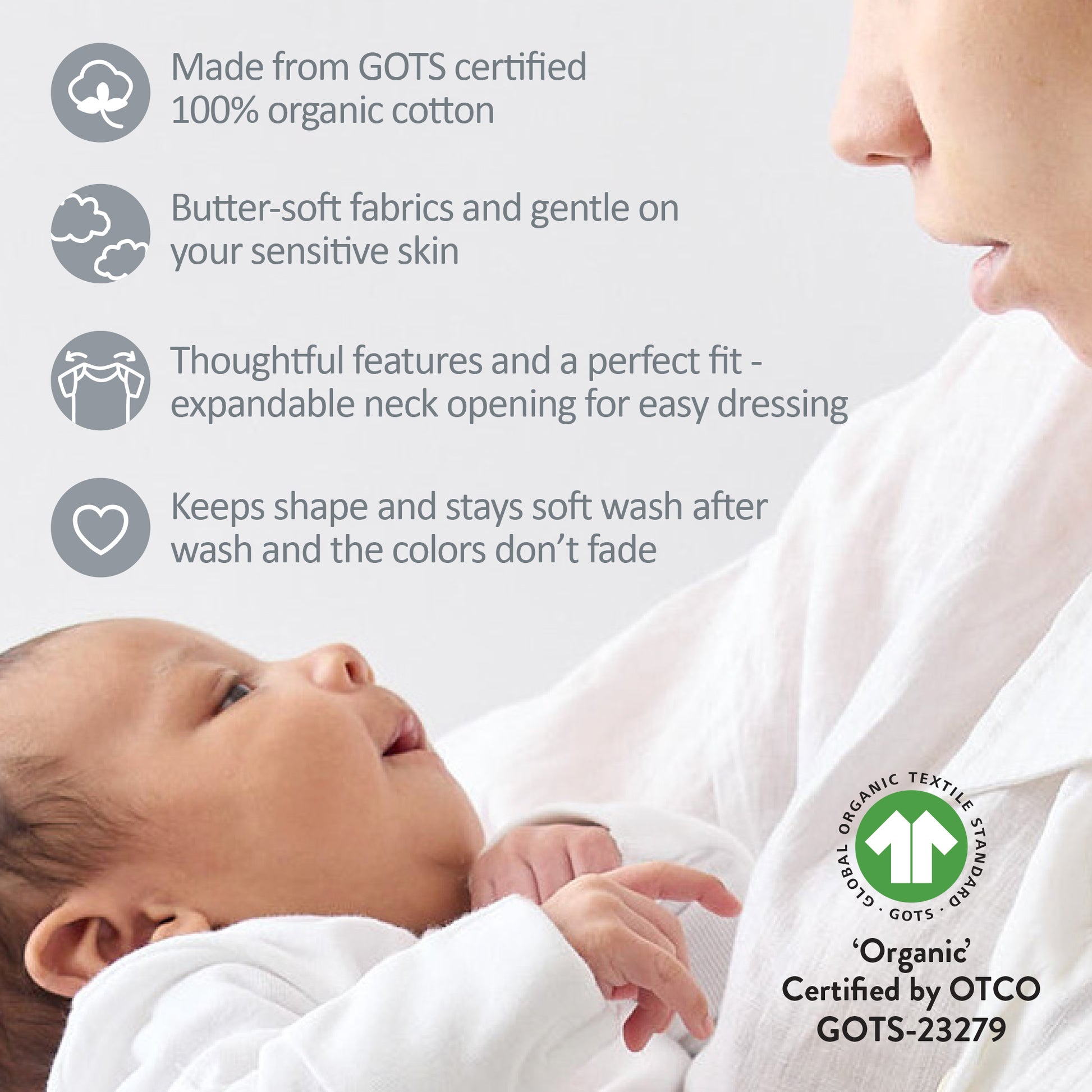 Baby wrapped in organic cotton fabric with GOTS certification label