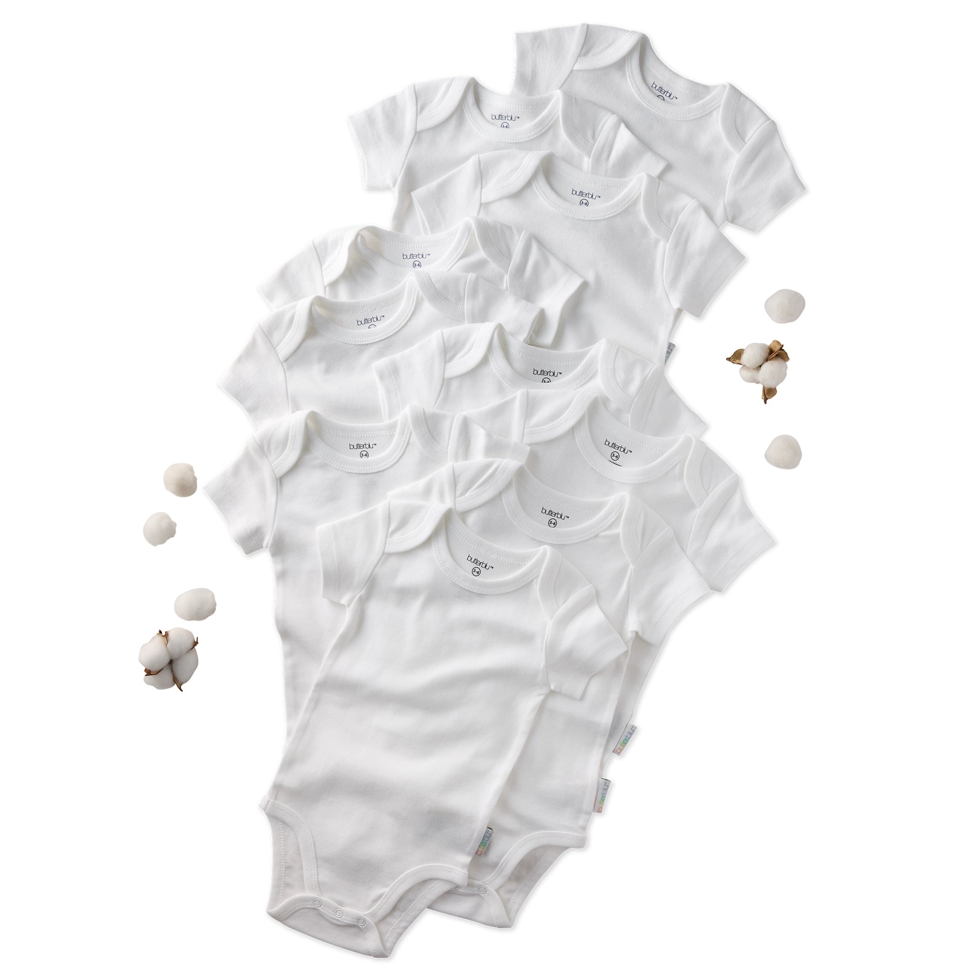 Multiple white baby bodysuits with brand name on a white background