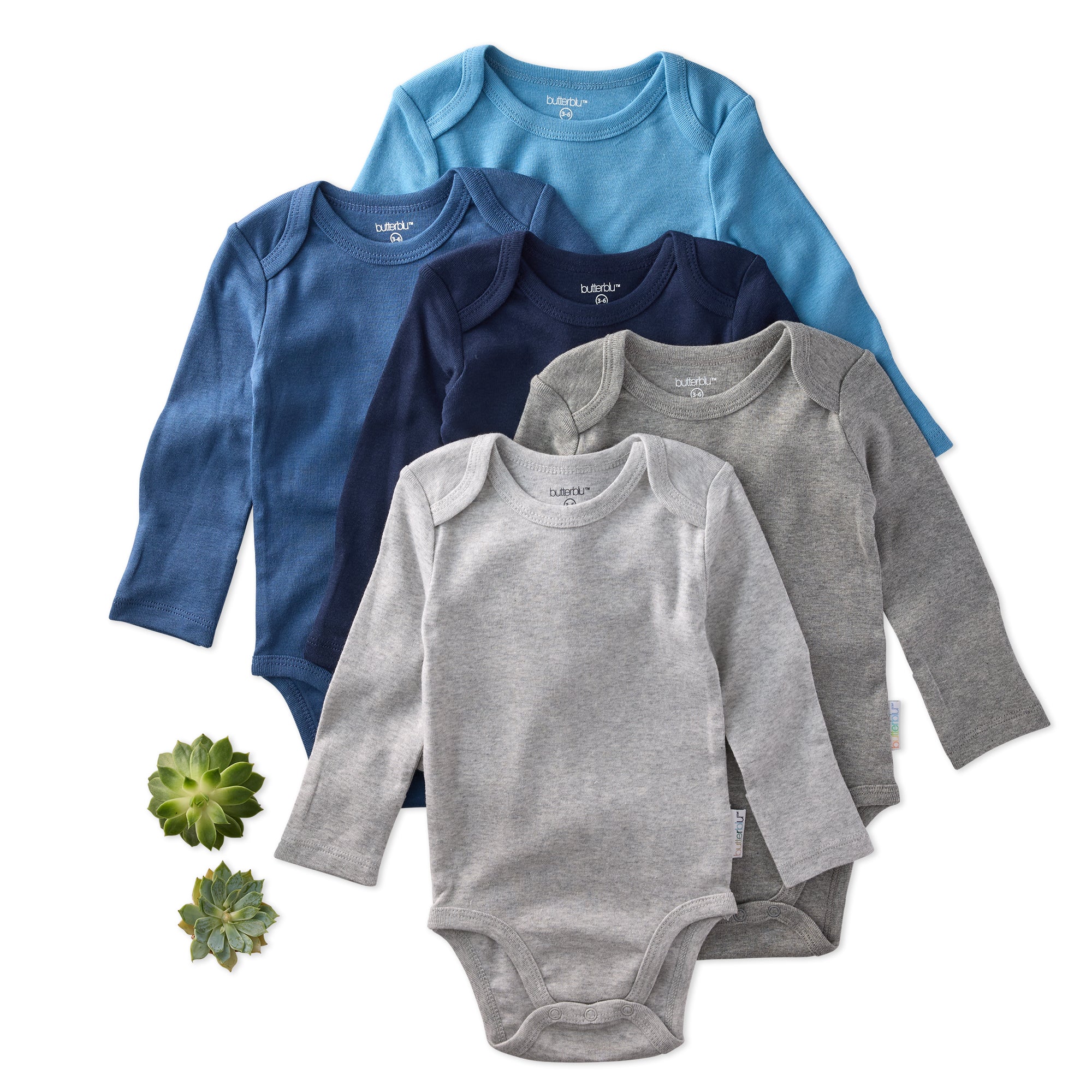Set of baby bodysuits in blue, gray, and navy on a white background