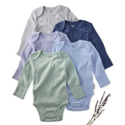 Set of five baby bodysuits in various colors on a white background