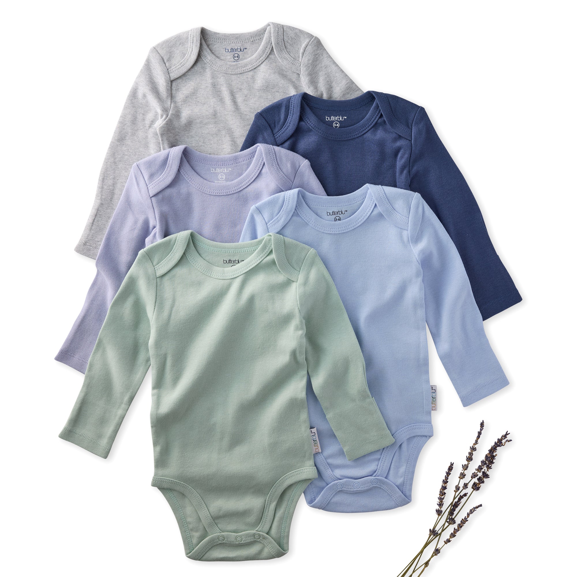Set of five baby bodysuits in various colors on a white background