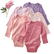 Five baby bodysuits in pink and purple on a white background with a flower.