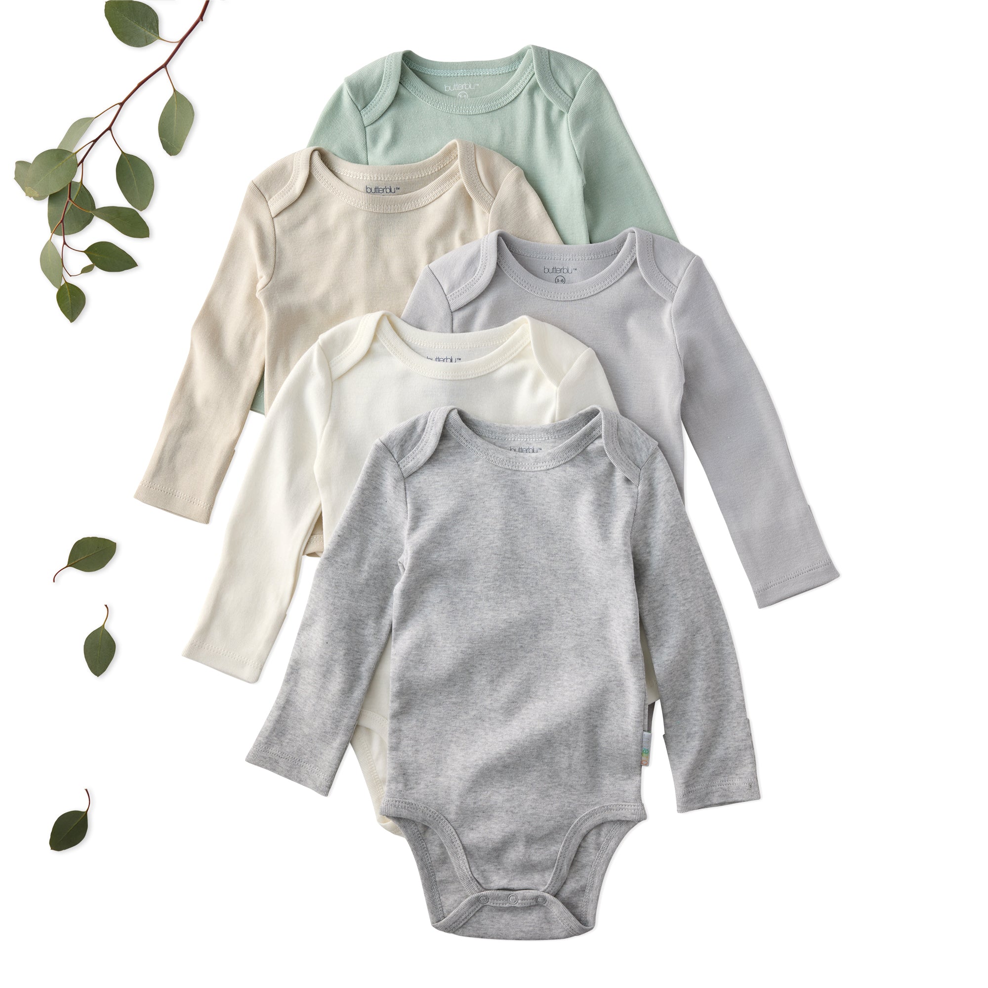 Five baby bodysuits in gray, beige, and green on a white background with leaves.