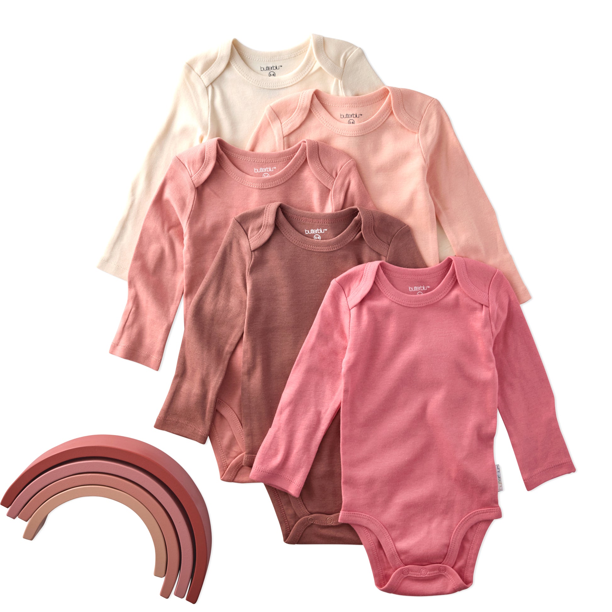 Set of baby bodysuits in various pink shades on a white background