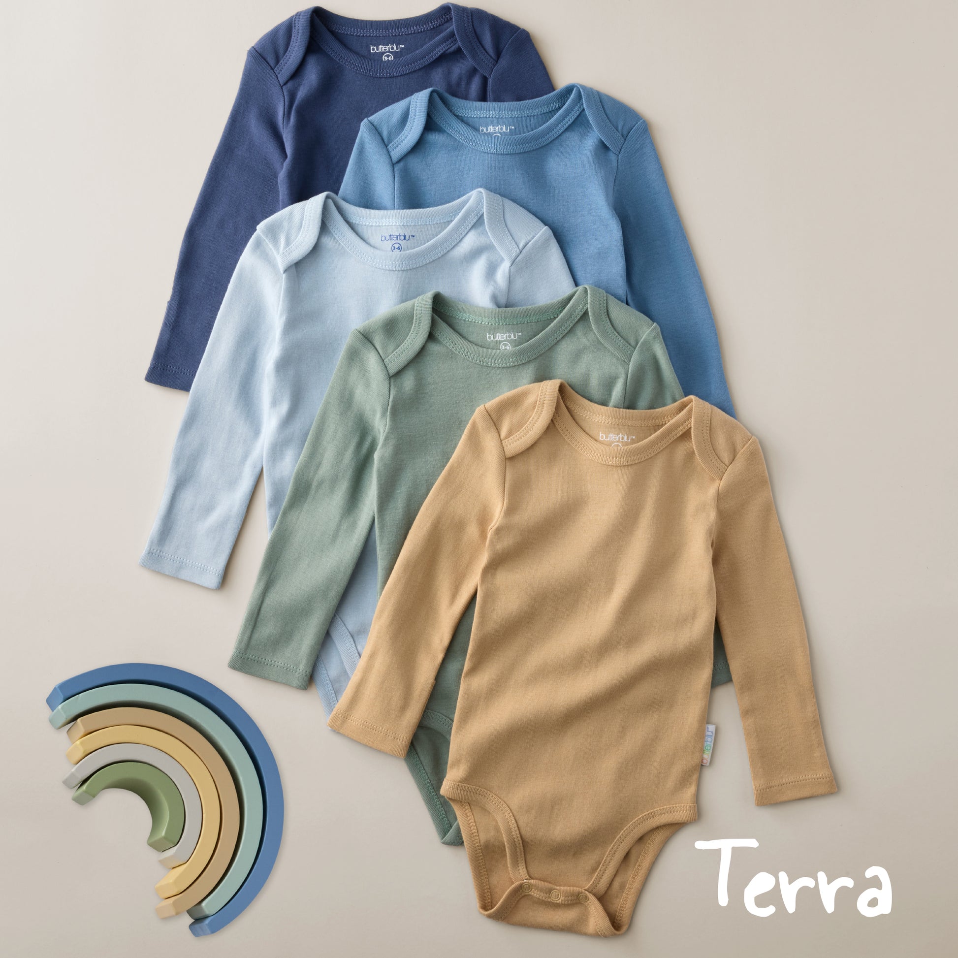 Set of five baby bodysuits in blue, green, and brown on a beige background with 'Terra' branding.