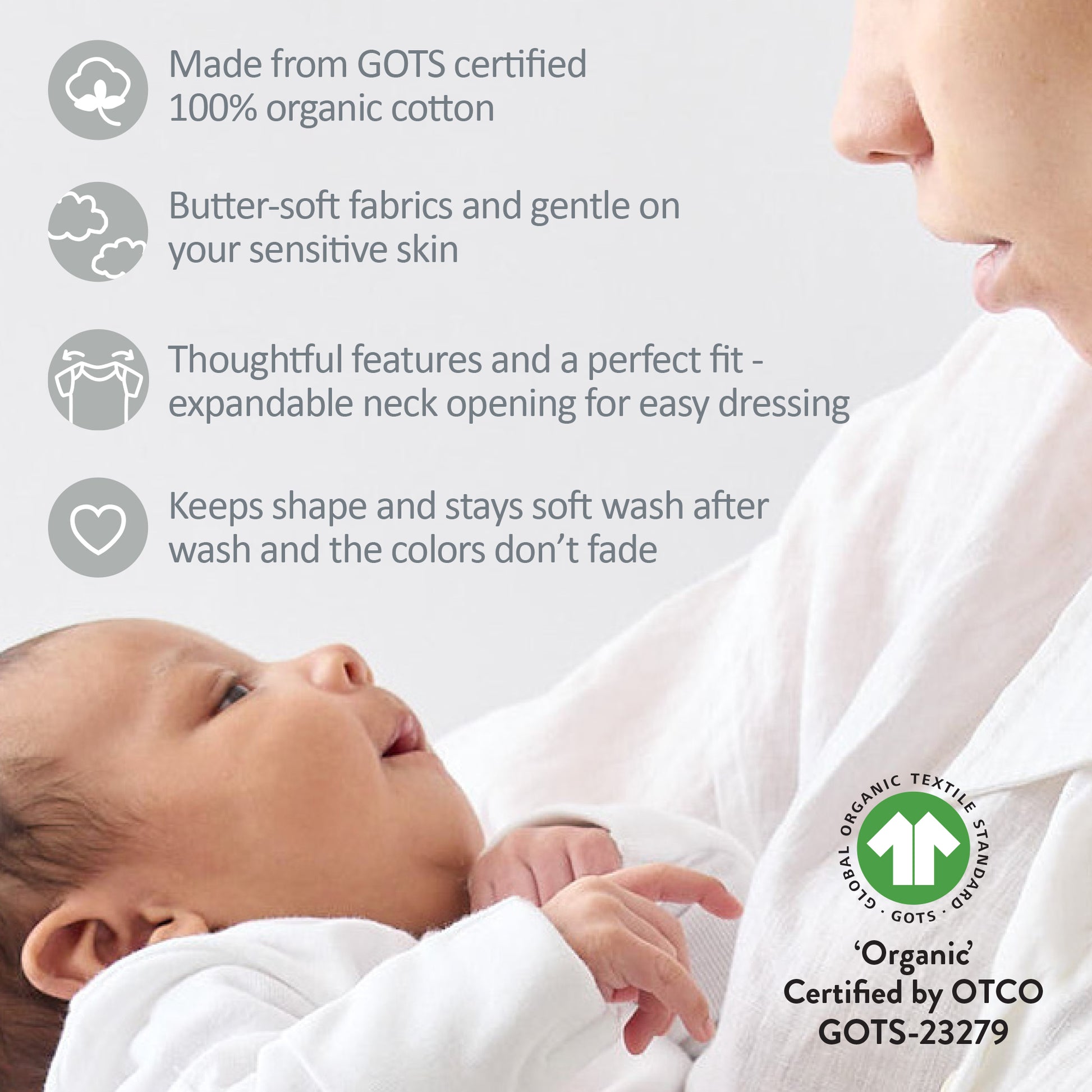 Baby wearing organic cotton clothing with a mother, featuring GOTS certification details.