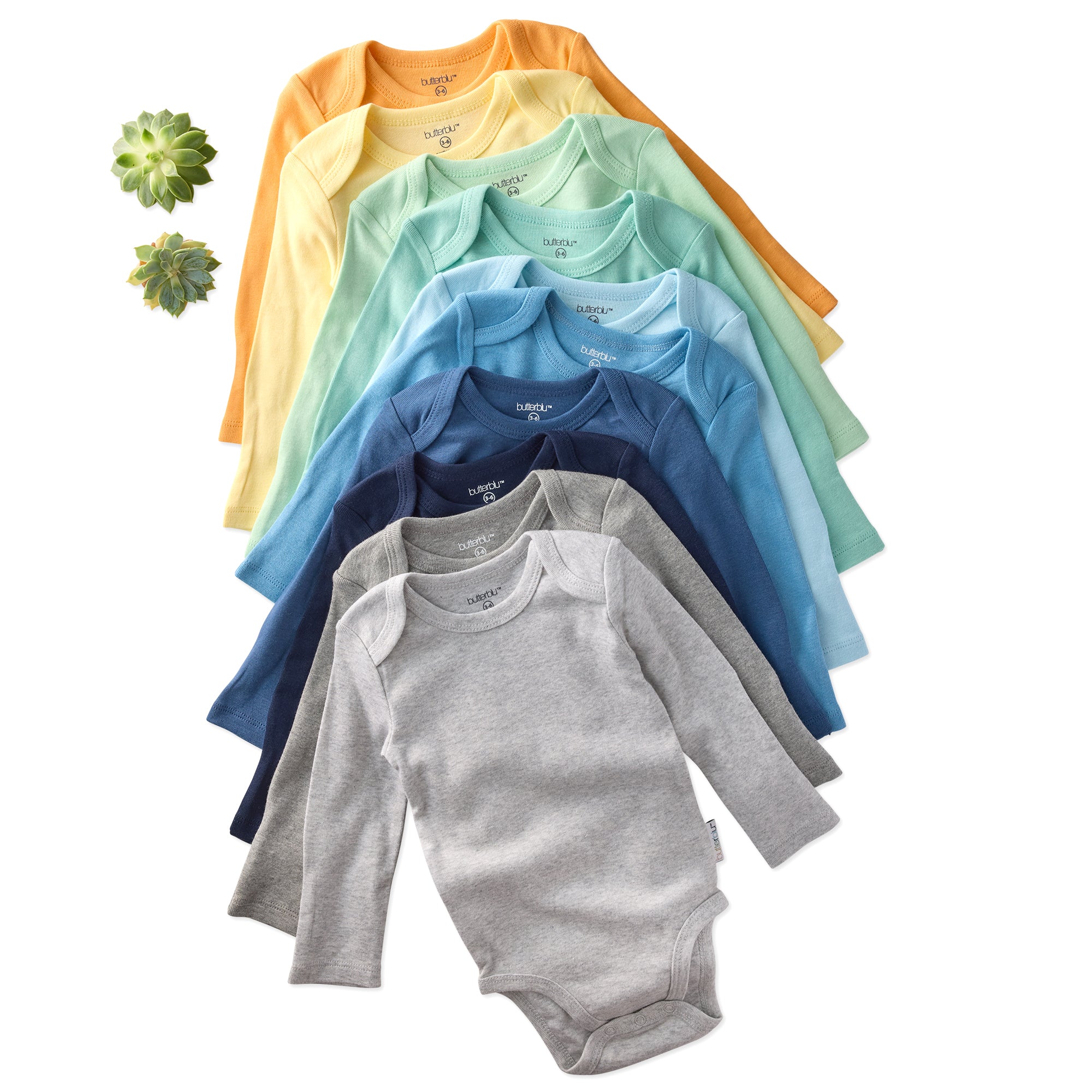 Set of baby bodysuits in blue, gray, and navy on a white background