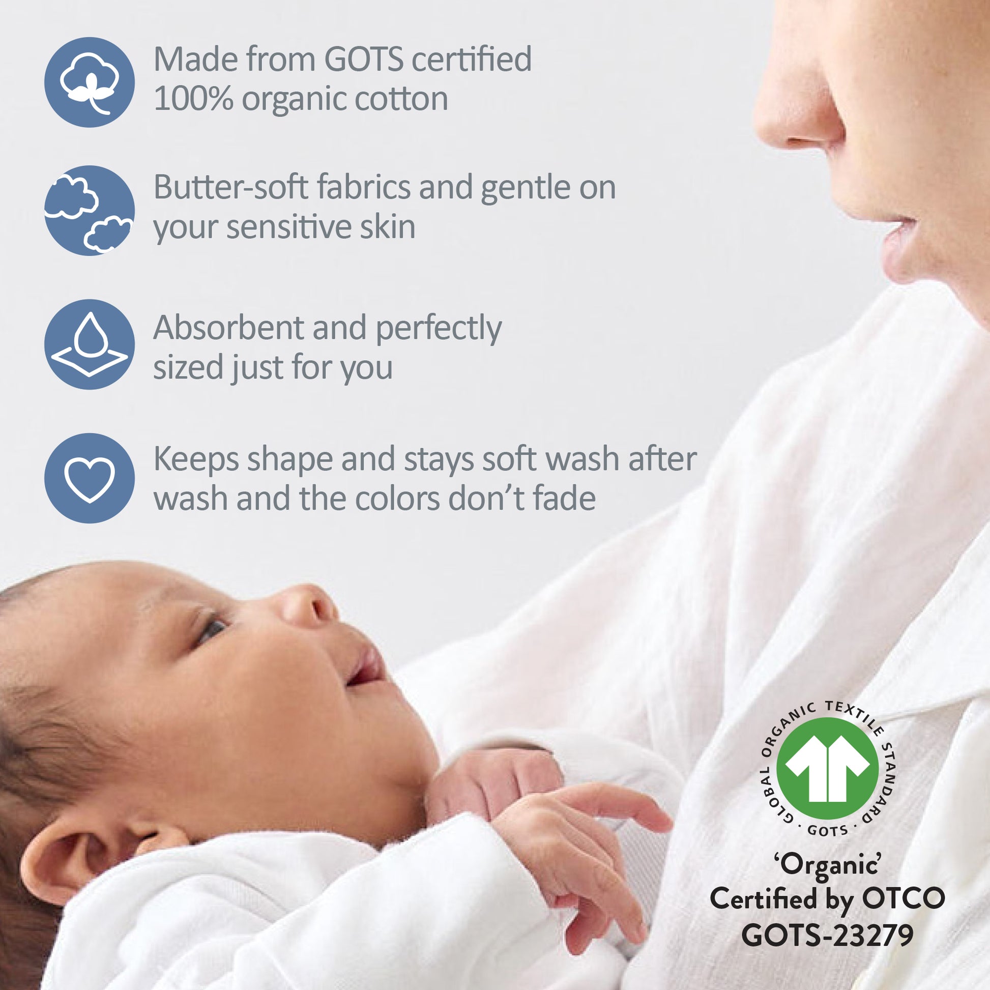Baby wrapped in a white blanket with GOTS certification logo and text about organic cotton.