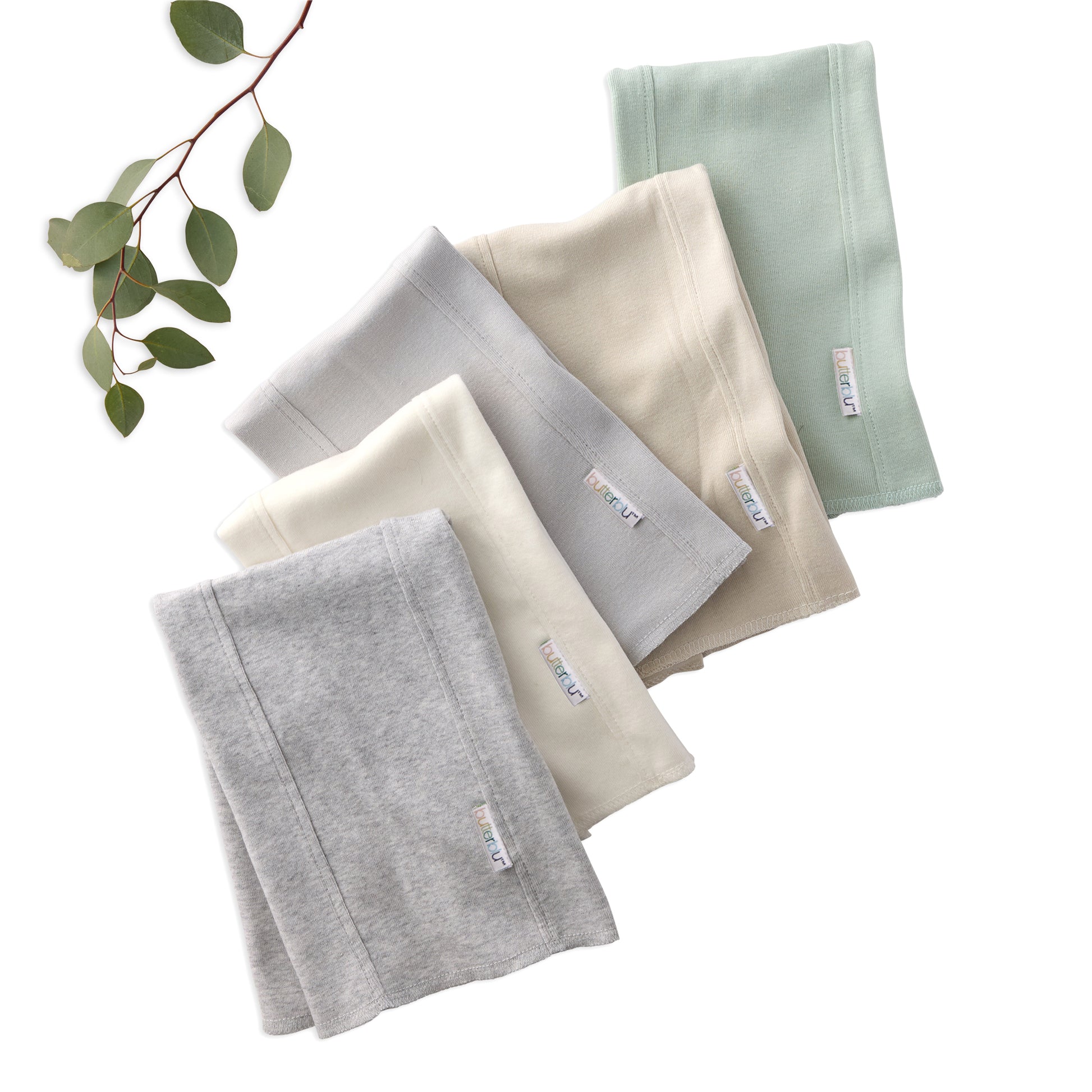 Set of folded BAILEY Burp Cloths in gray, beige, and green on a white background with a branch of leaves.