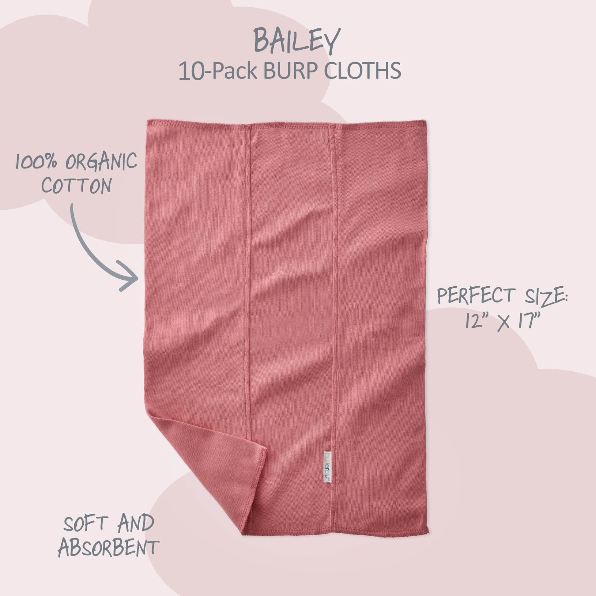 Pink burp cloth with product details on a light pink background