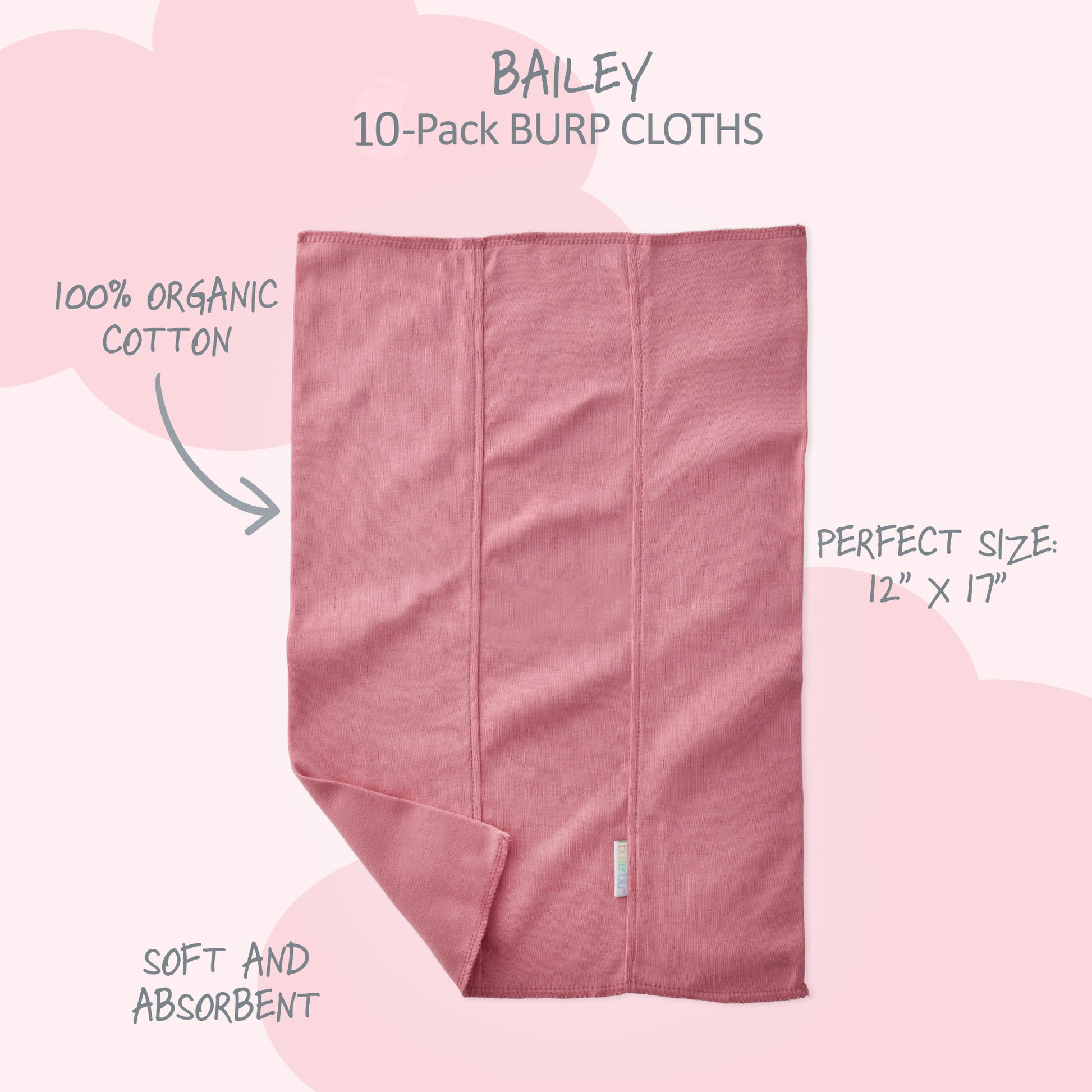 Pink burp cloth with text highlighting features on a pink background