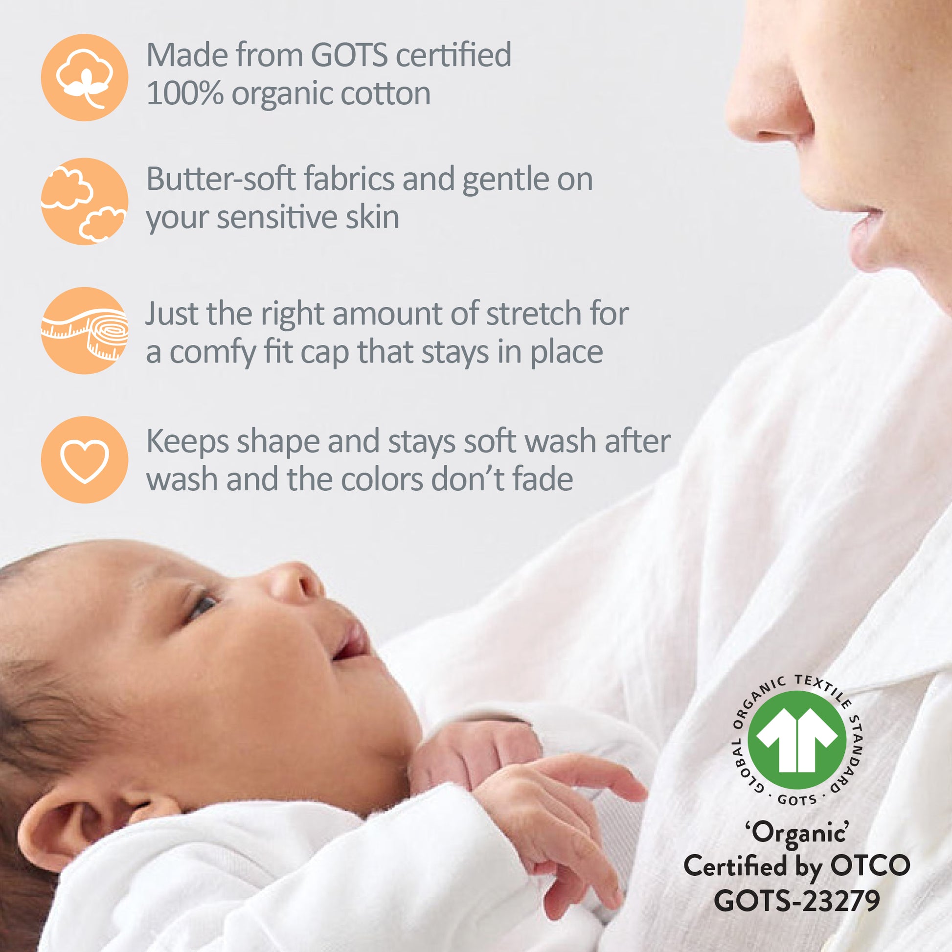 Baby being held by a person with text about organic cotton clothing and certification.