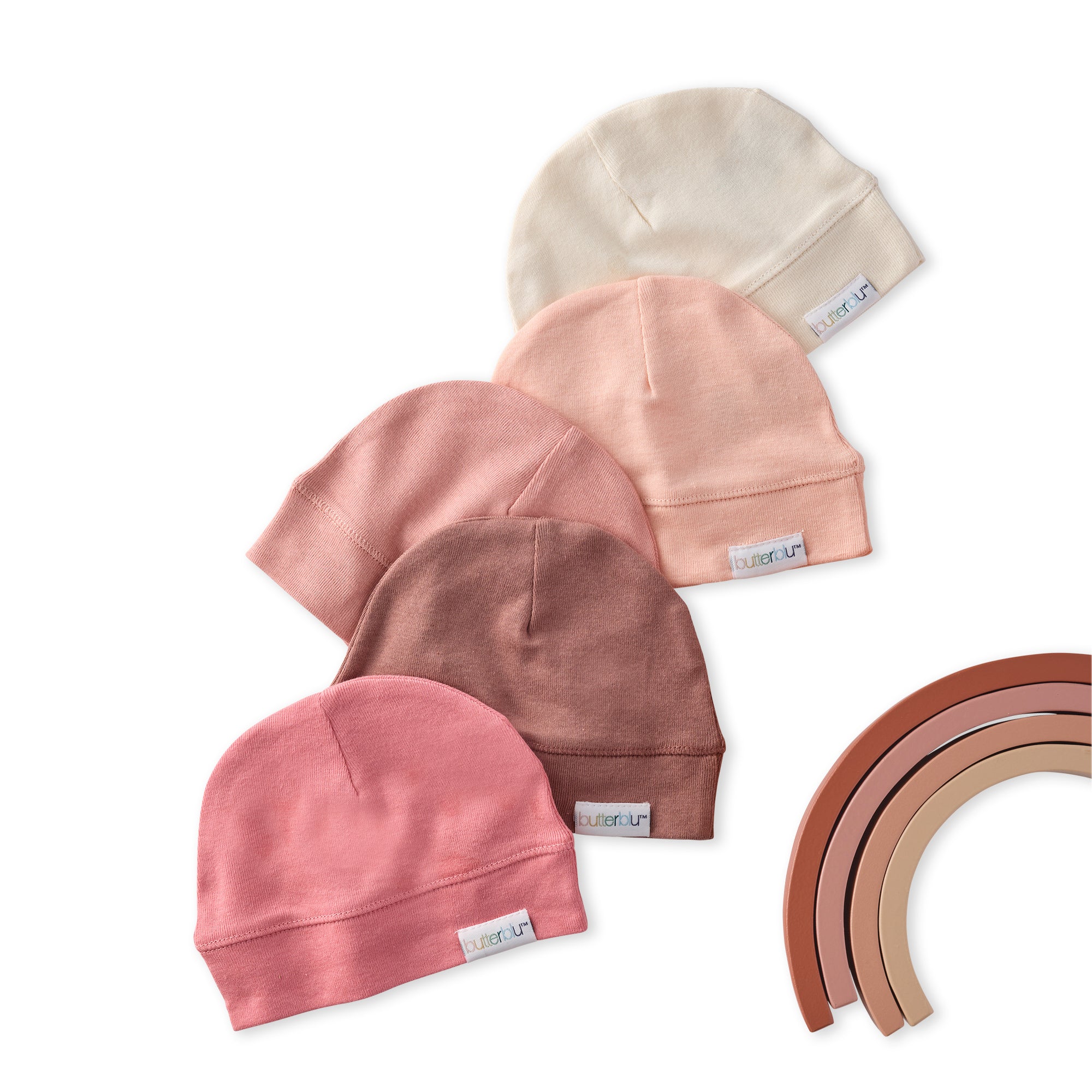 Set of baby hats in various colors on a white background