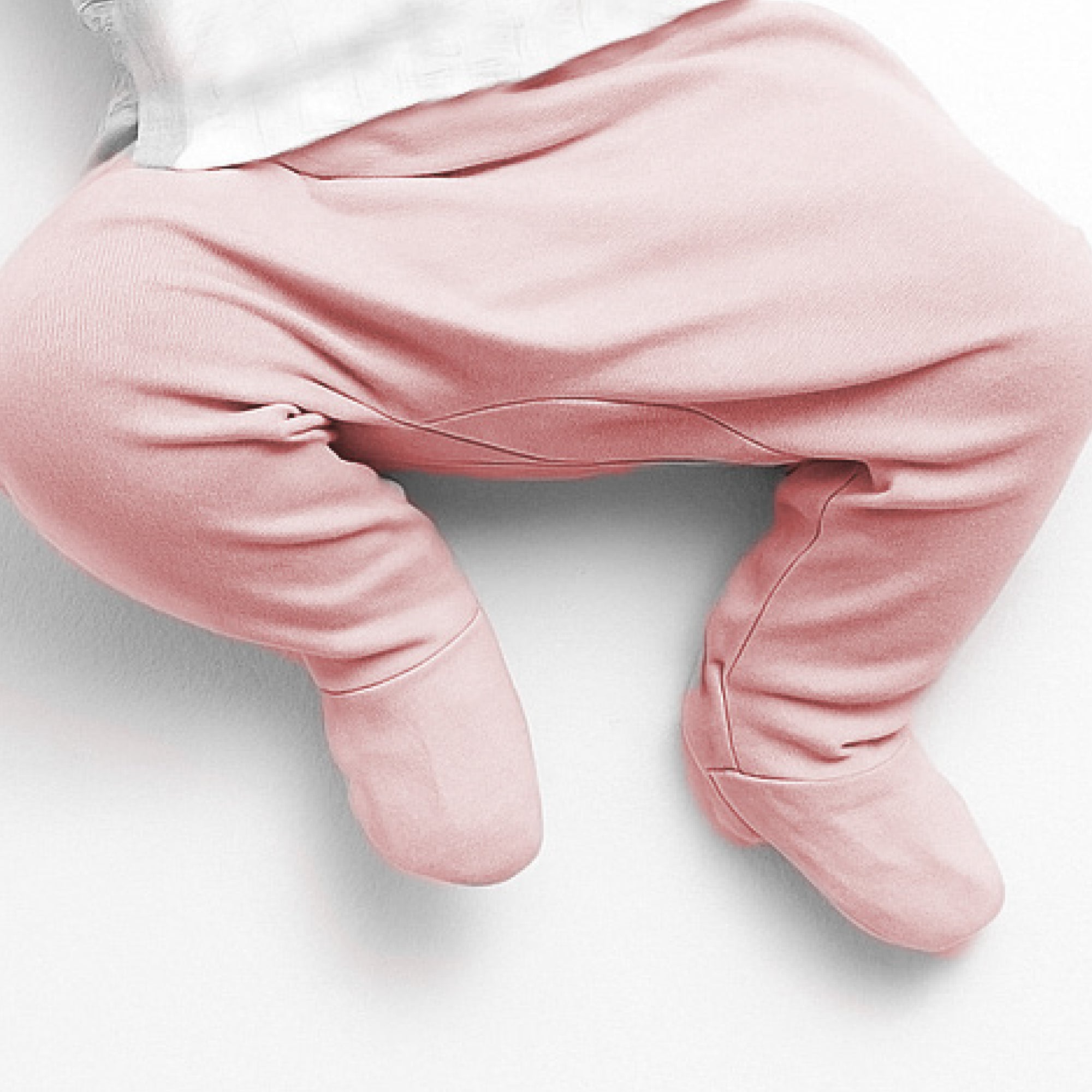 Pink baby pants on a white background
