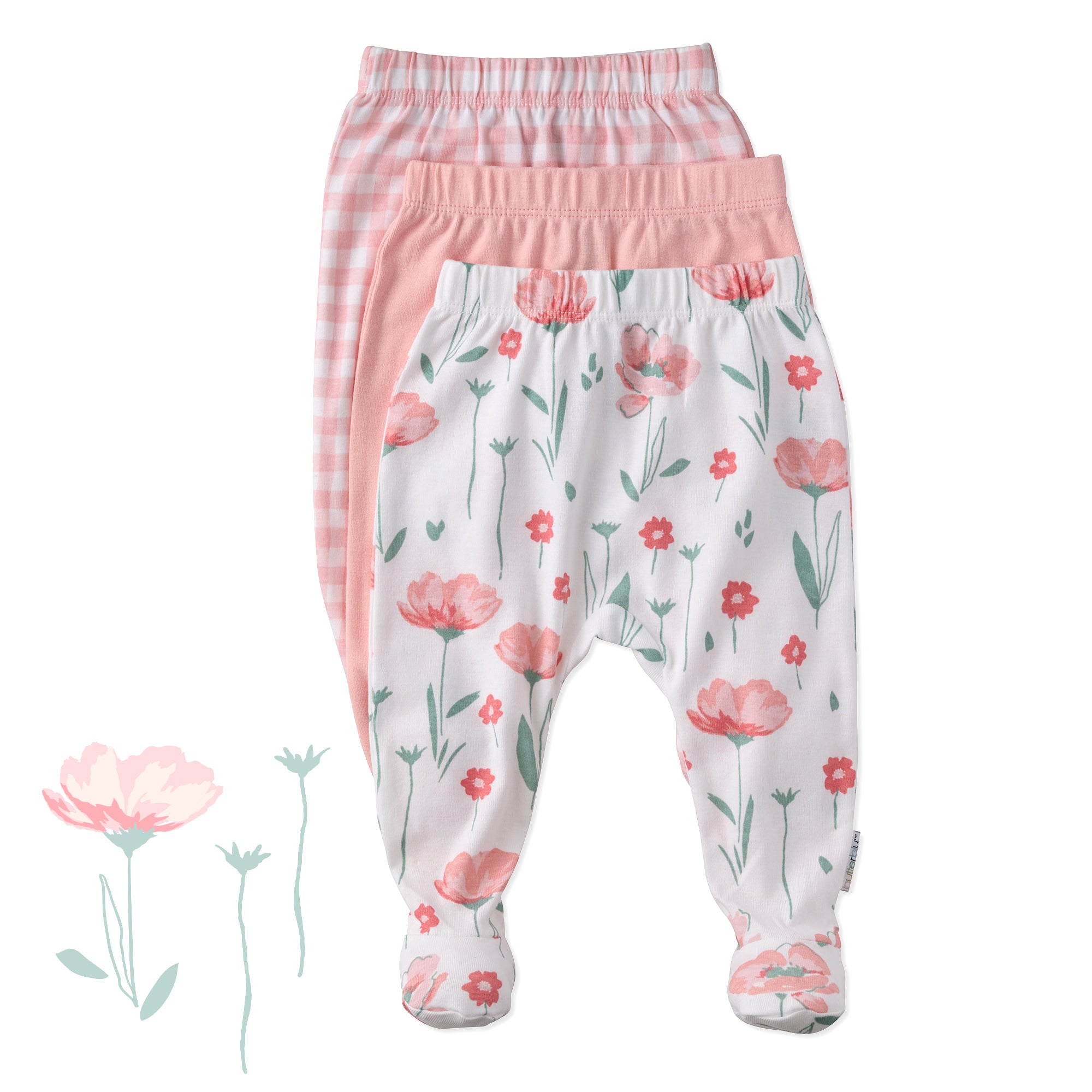 Set of three baby pants with floral patterns on a white background