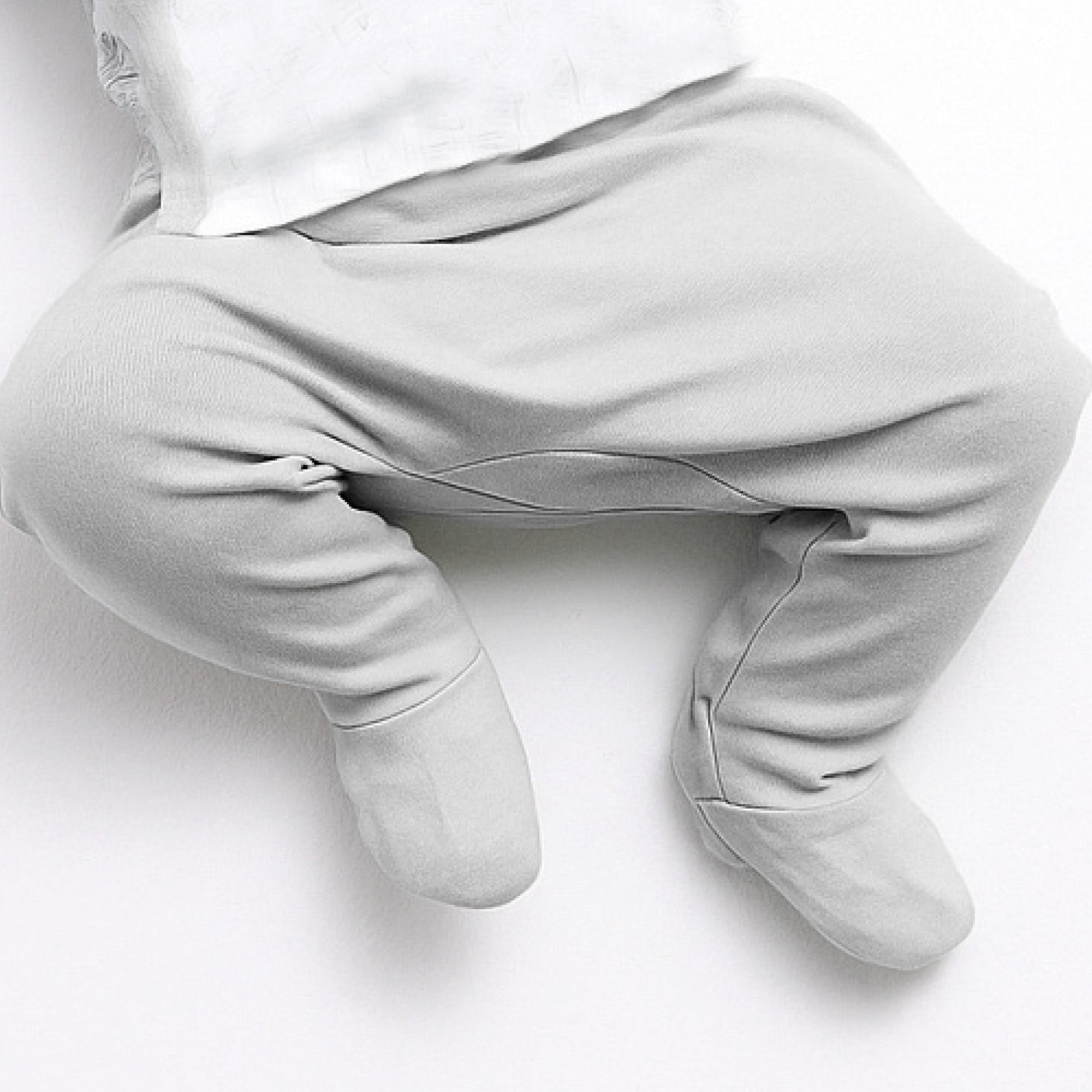 Light gray hoodie and pants set on a white background