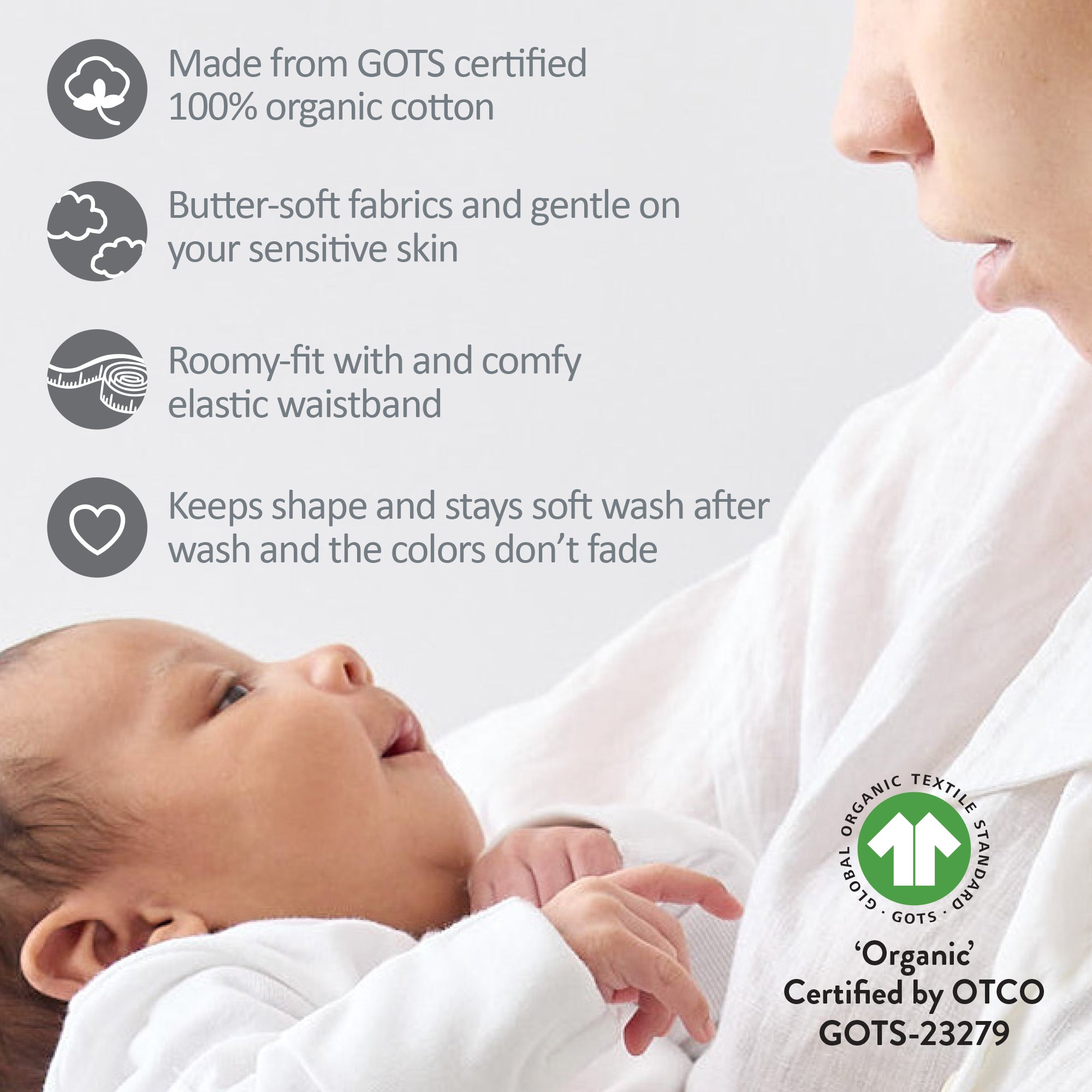 Baby wrapped in organic cotton fabric with GOTS certification label