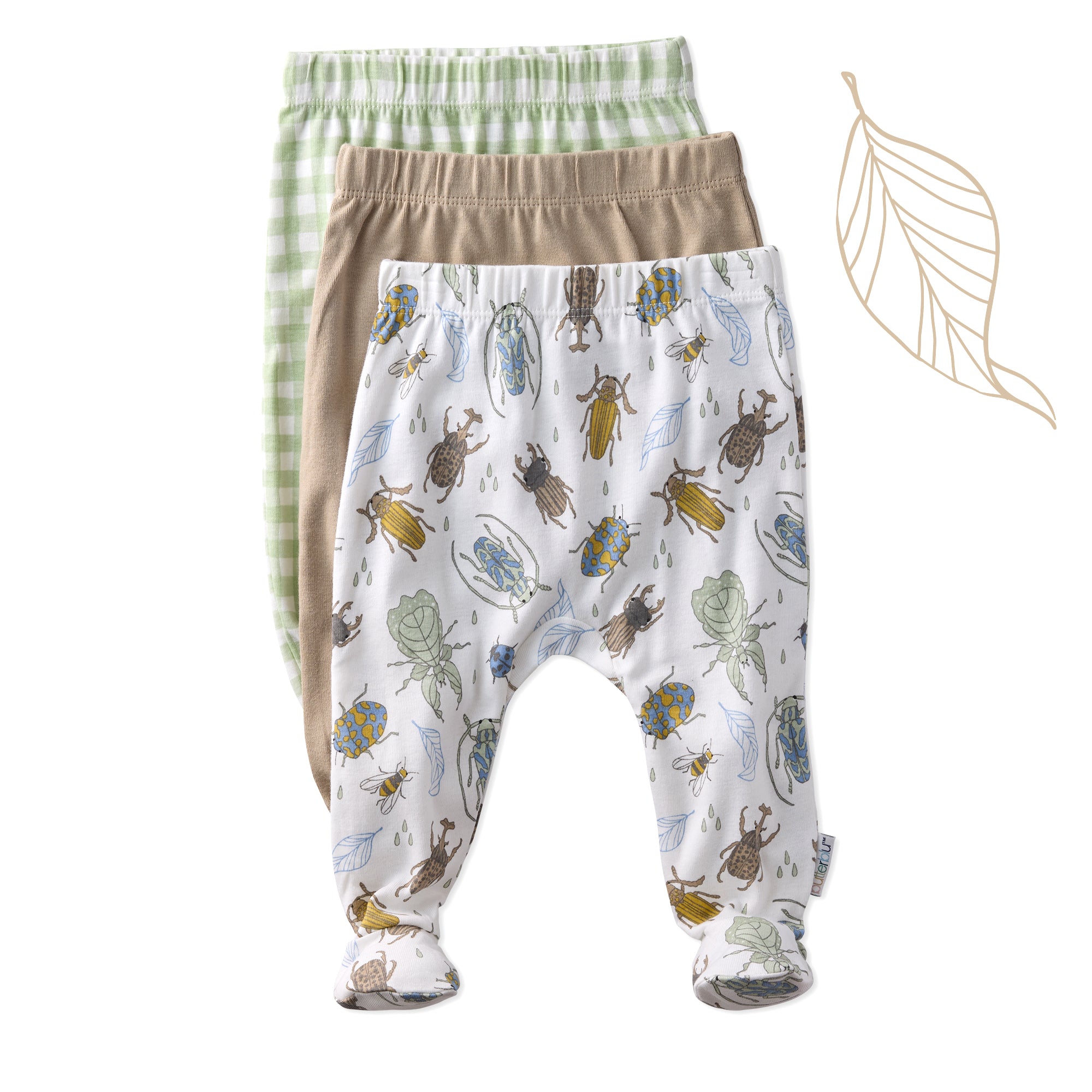 Three pairs of baby pants with different patterns on a white background