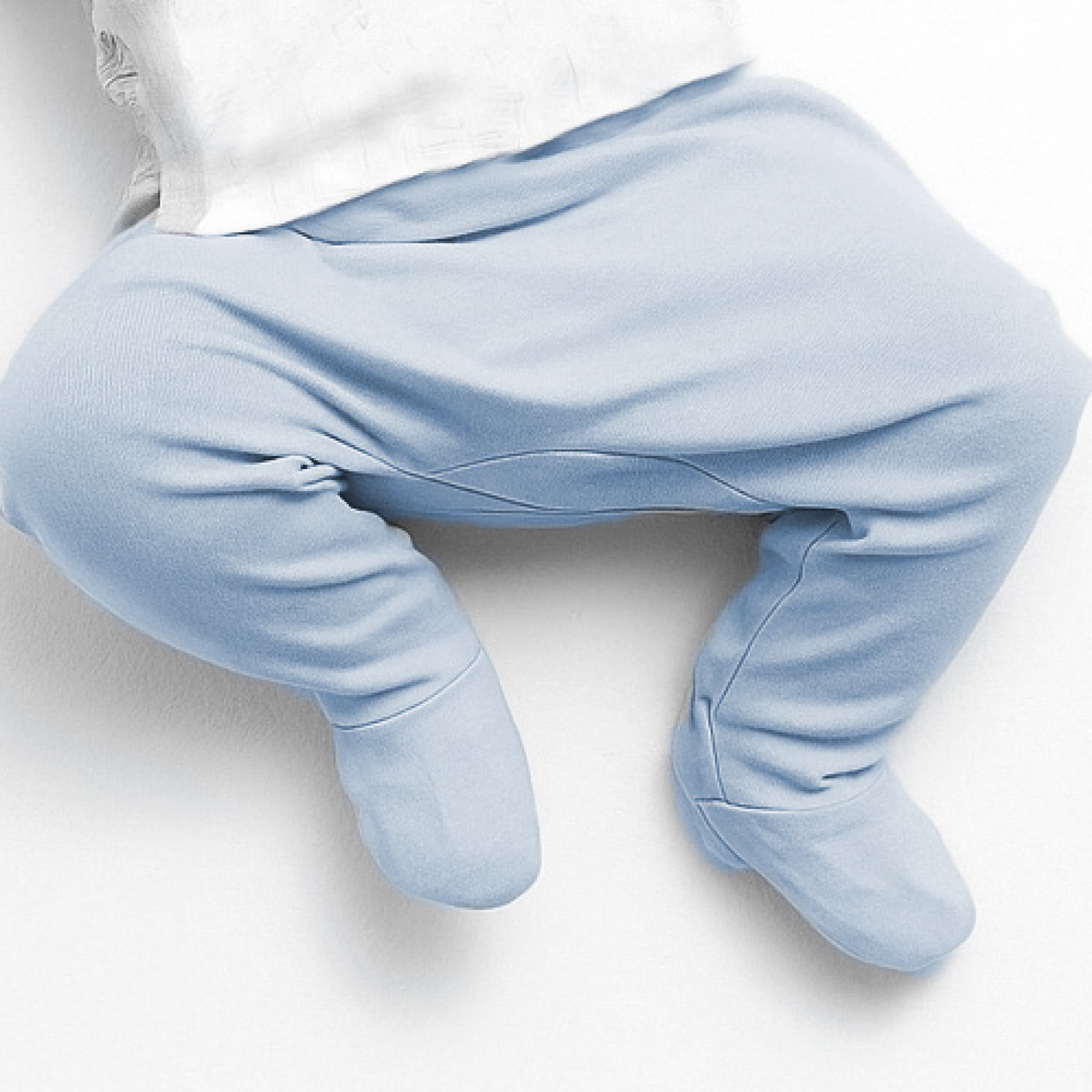 Light blue baby pants on a white background