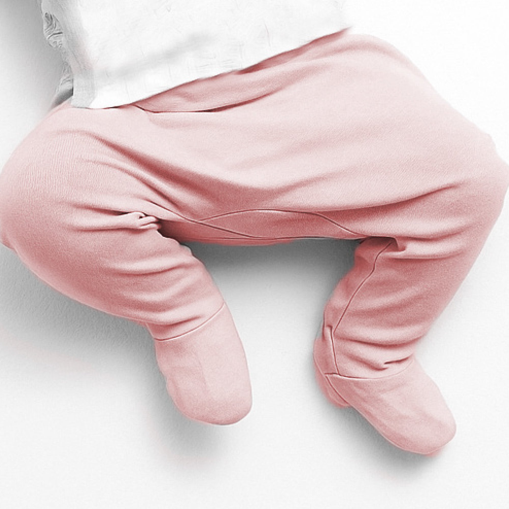 Pink baby pants on a white background