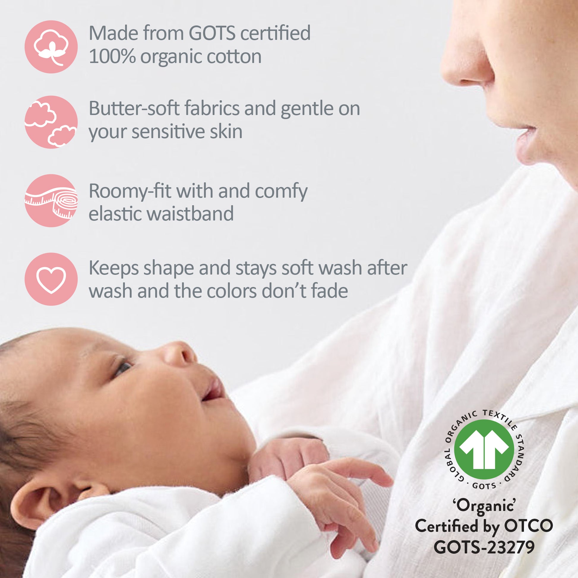 Baby wrapped in white fabric with GOTS certification label and product features listed.