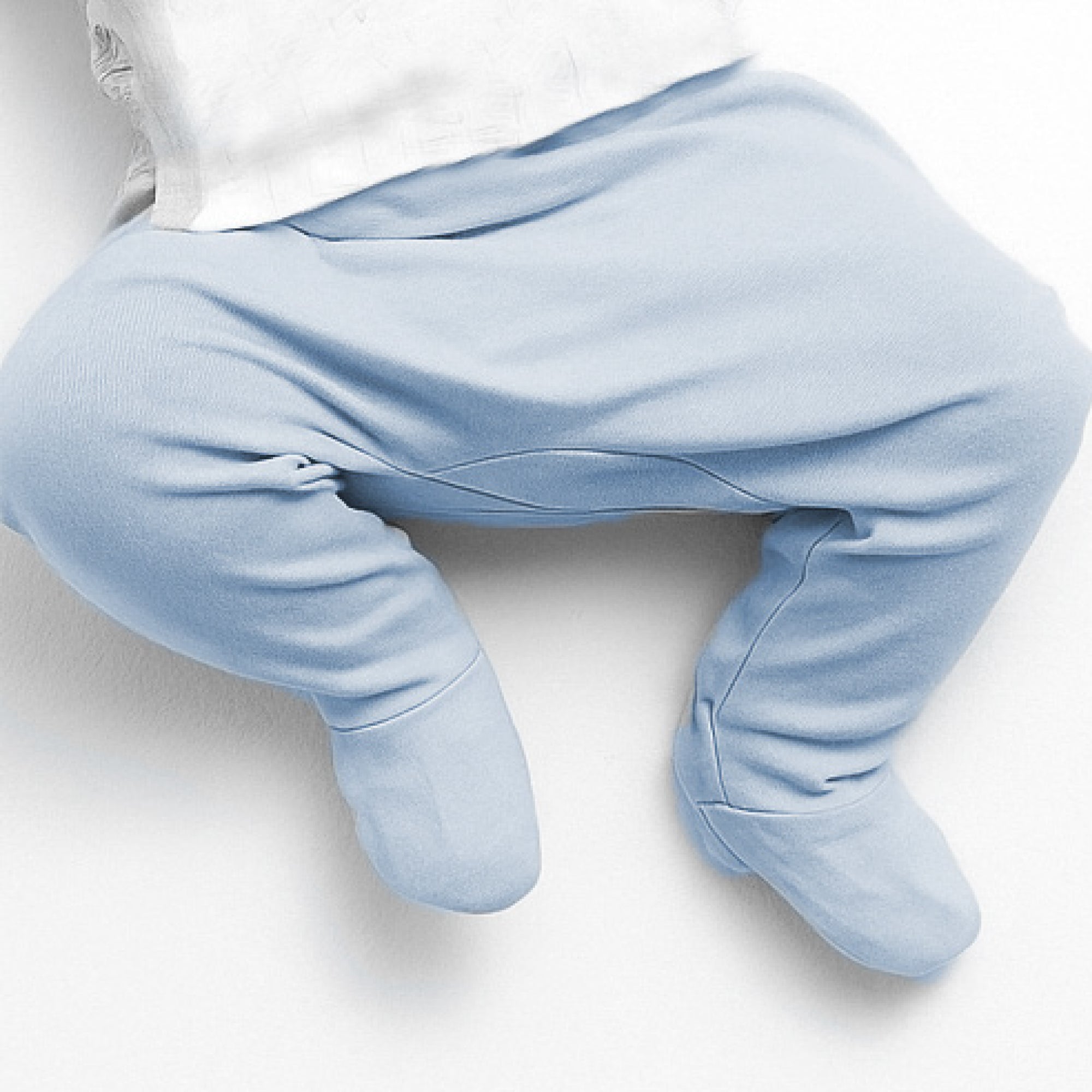 Light blue baby pants on a white background