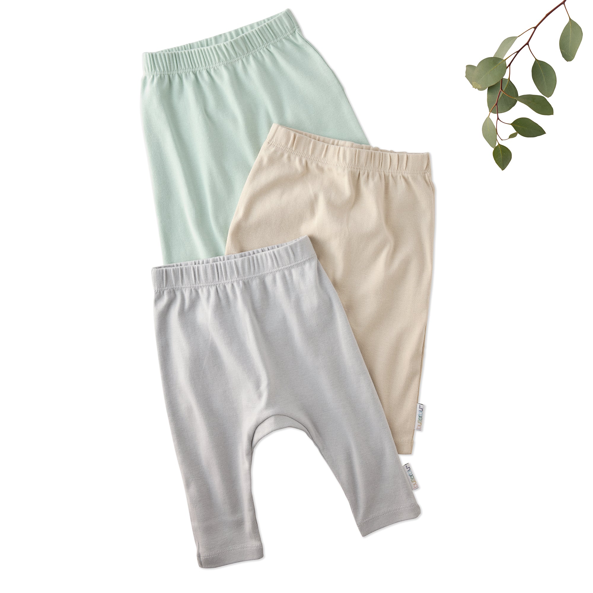 Layout of 3 pairs of harem pants in Seafoam on a white background with a leaf detail
