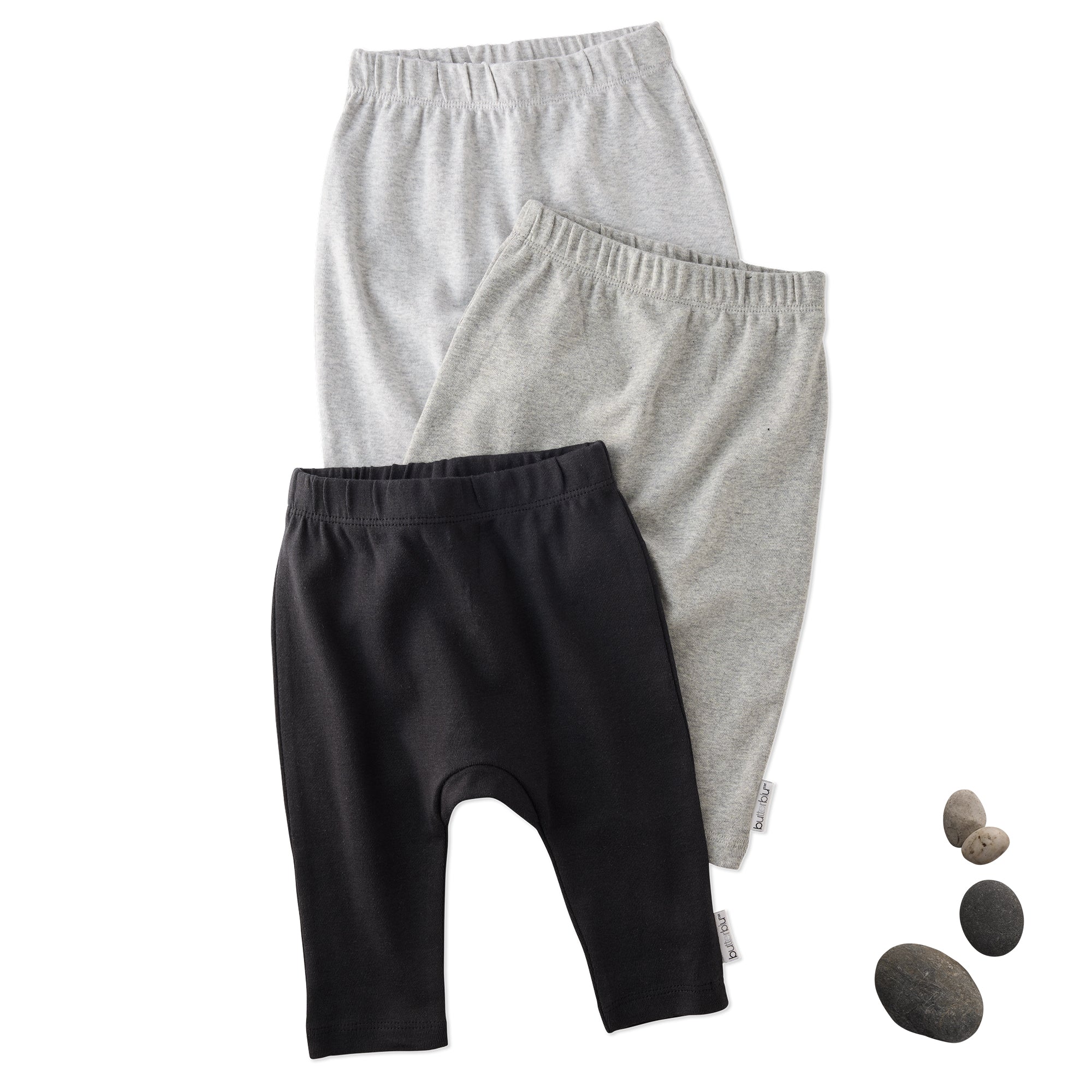 Layout of 3 pairs of harem pants in Stone on a white background with a stone detail
