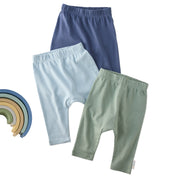 Layout of 3 pairs of harem pants in Terra on a white background with a rainbow detail
