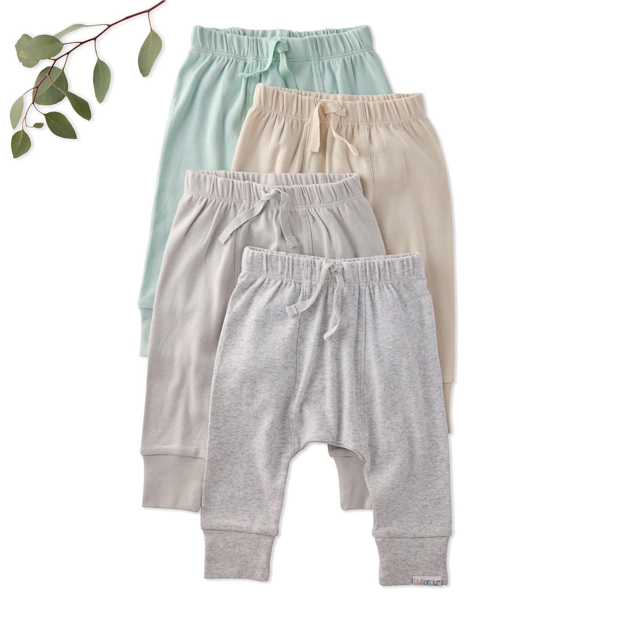 4 pairs of green, beige, tan, and grey children's sweatpants on a white background