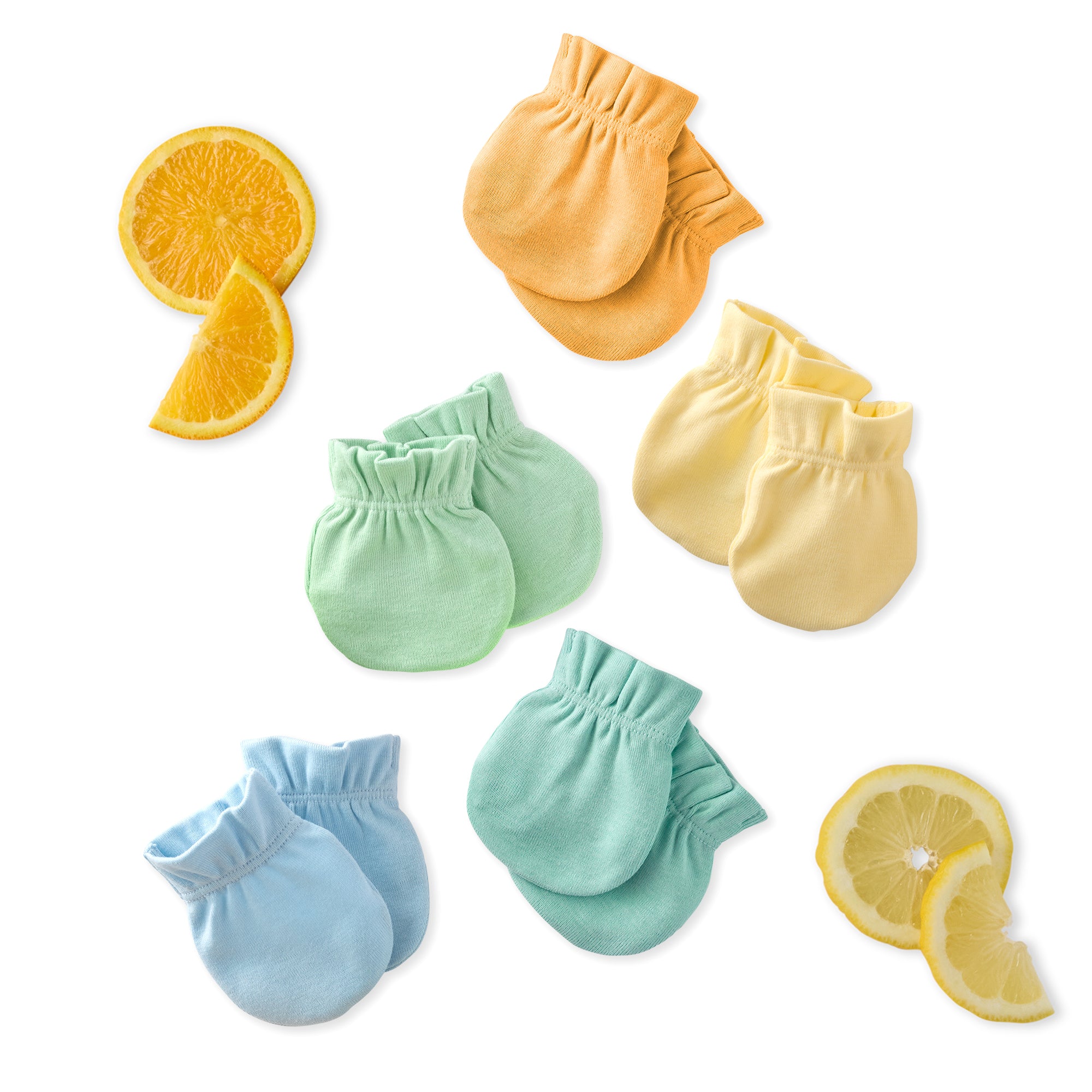 Set of colorful baby mittens with orange, lemon, and lime slices on a white background