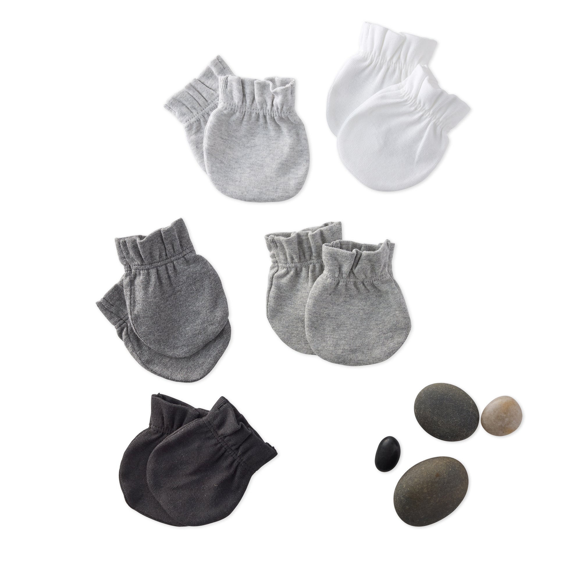 Set of gray and black baby mitts with small stones on a white background