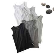 5 sleeveless shirts in Stone on a white background with stones
