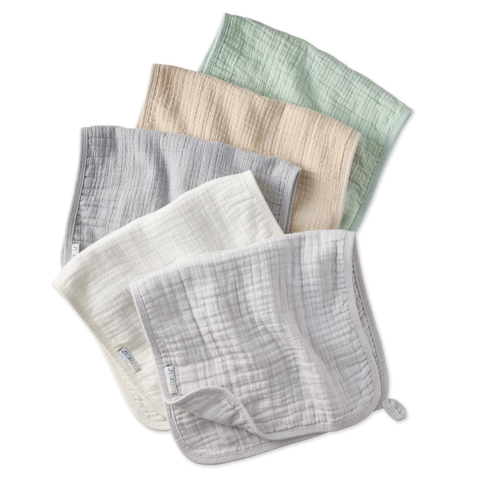 Set of five fabric burp cloths in various colors on a white background