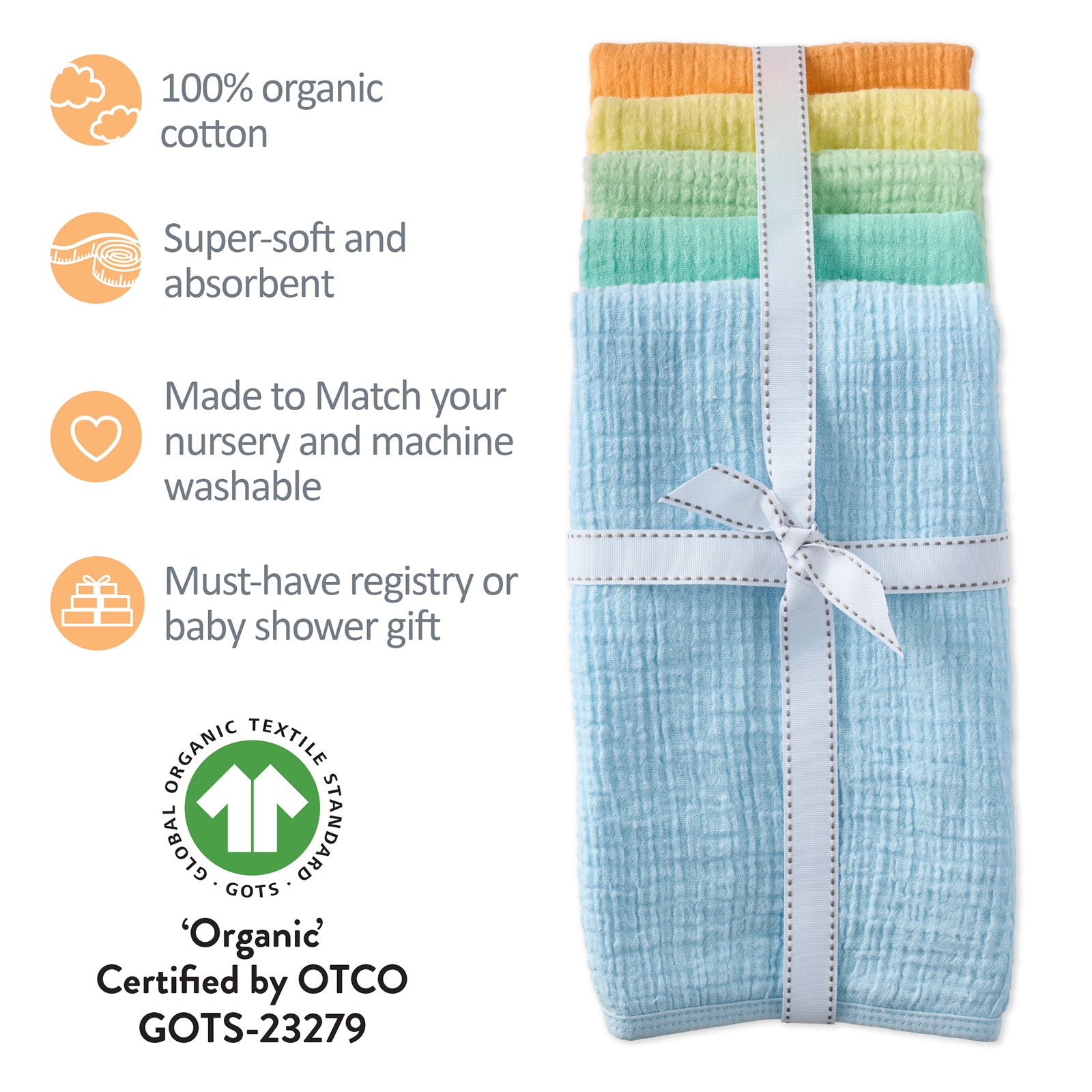 Stack of colorful baby towels with certification details on a white background