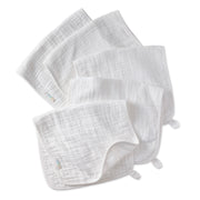 Set of white baby burp cloths on a white background