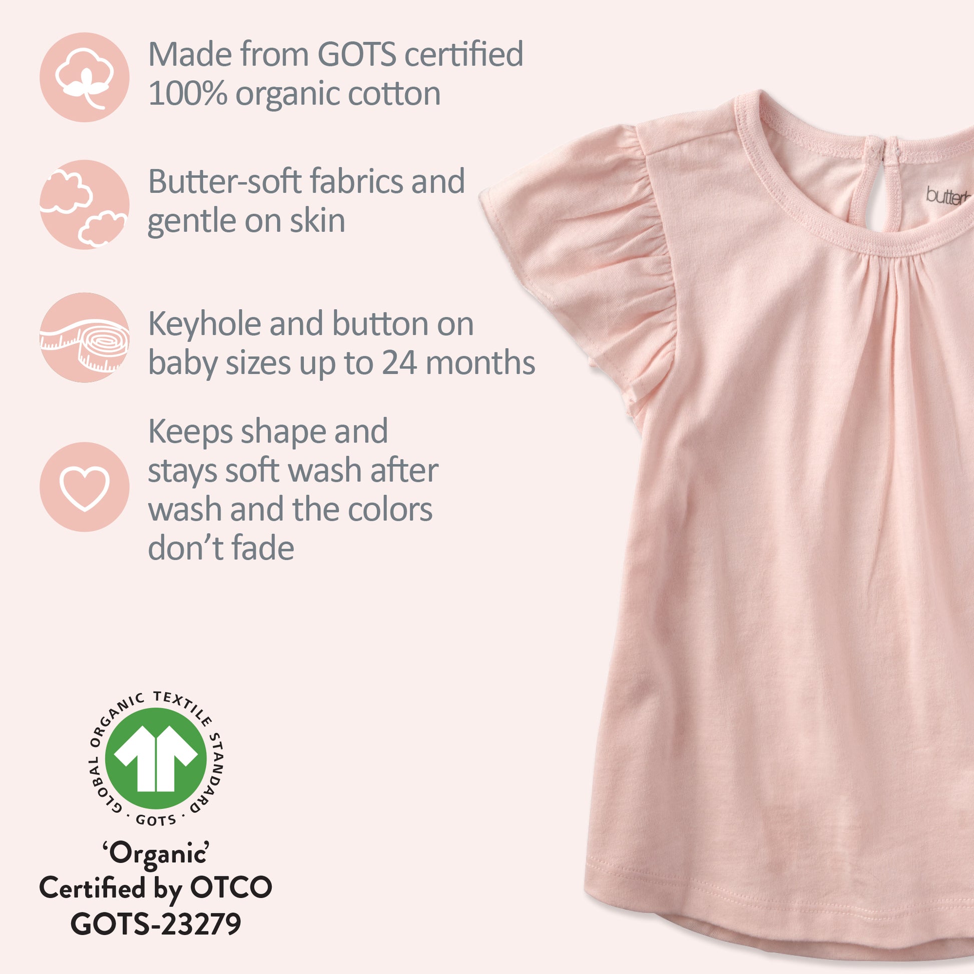 Pink baby top with organic cotton certification details on a white background