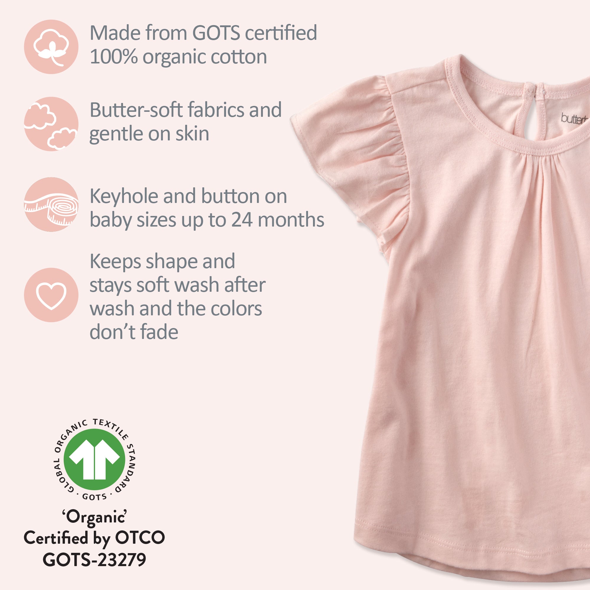 Pink baby top with organic cotton certification details on a white background