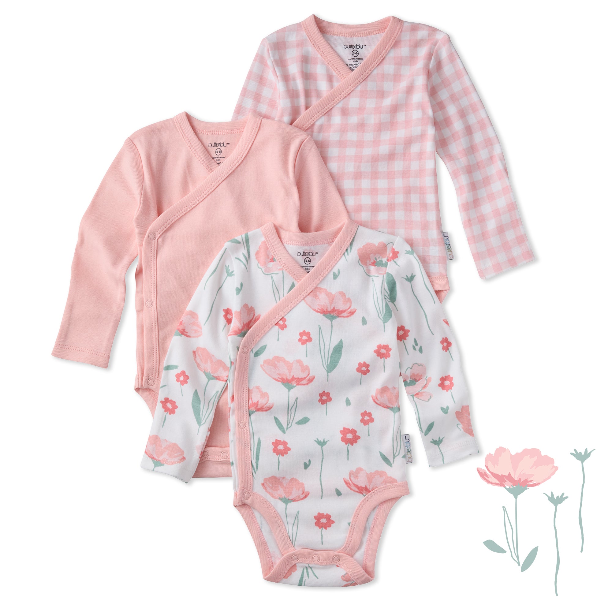 Three baby outfits with floral patterns on a white background