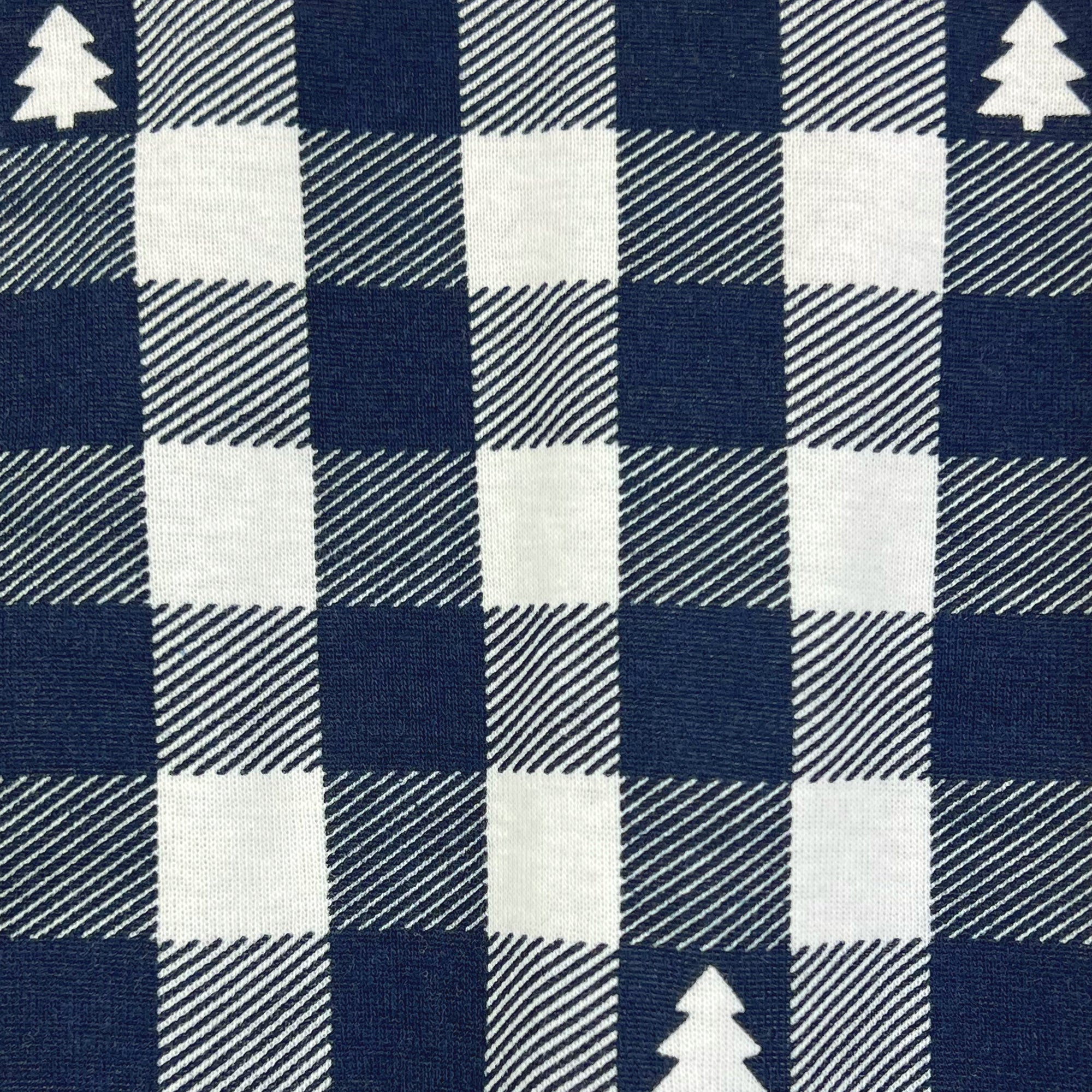 Navy and white checkered fabric with tree patterns
