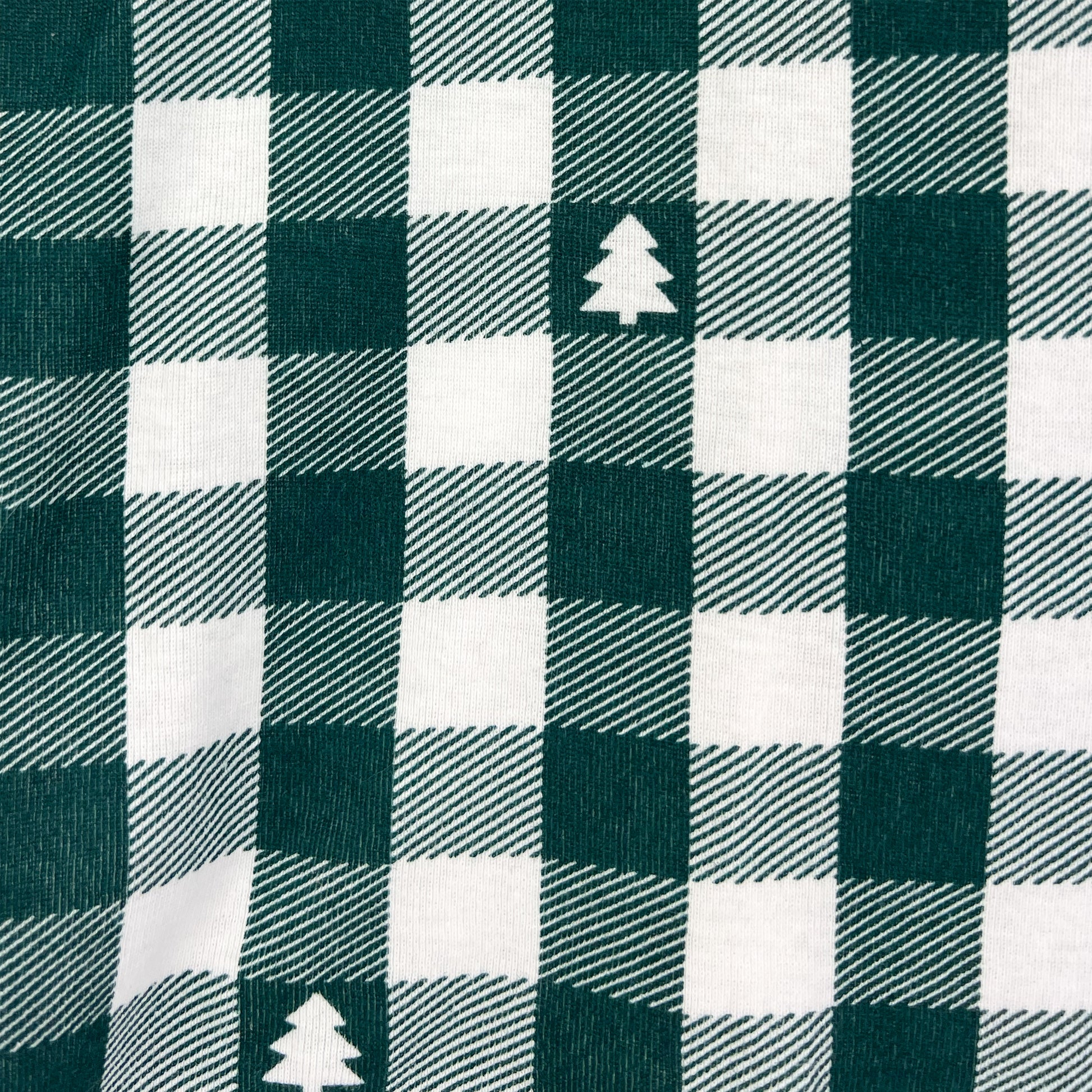 Green and white checkered fabric with tree pattern