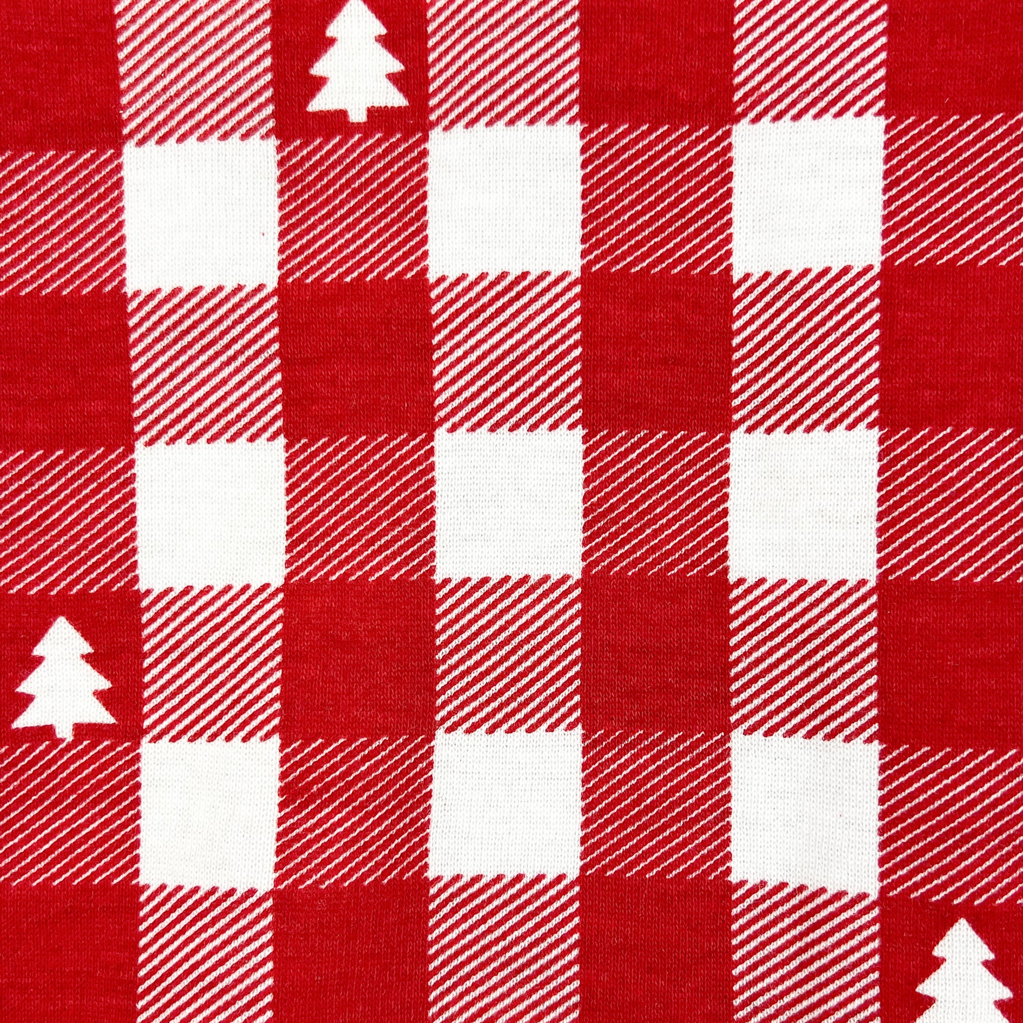 Red and white checkered fabric with white Christmas tree shapes